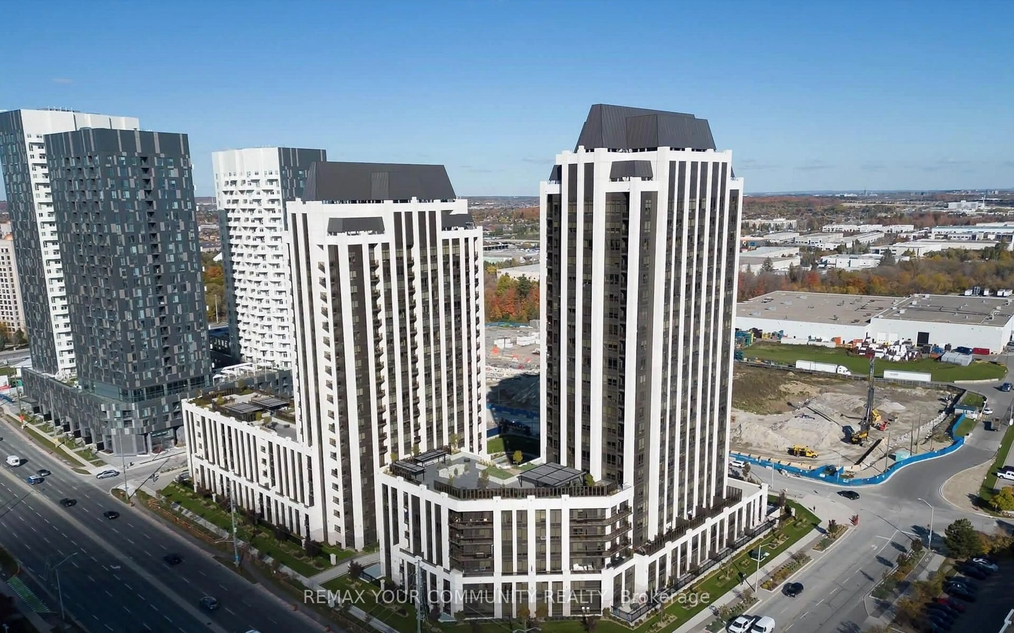 A pic from outside/outdoor area/front of a property/back of a property/a pic from drone, building for 9075 Jane St #406, Vaughan Ontario L4K 0L7
