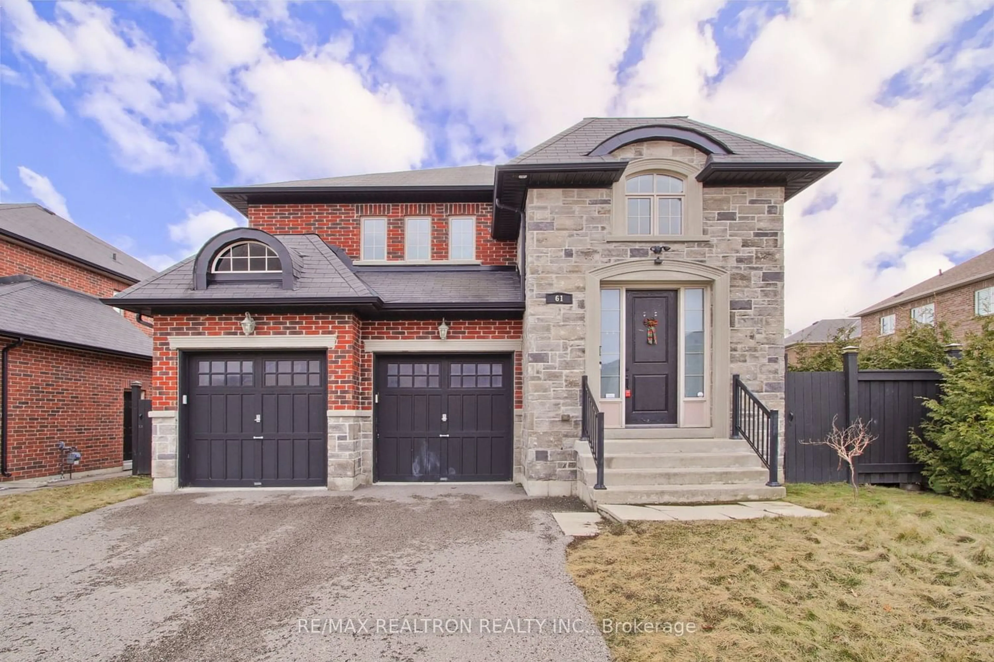 Home with brick exterior material for 61 Bannerman Dr, Bradford West Gwillimbury Ontario L3Z 3J4