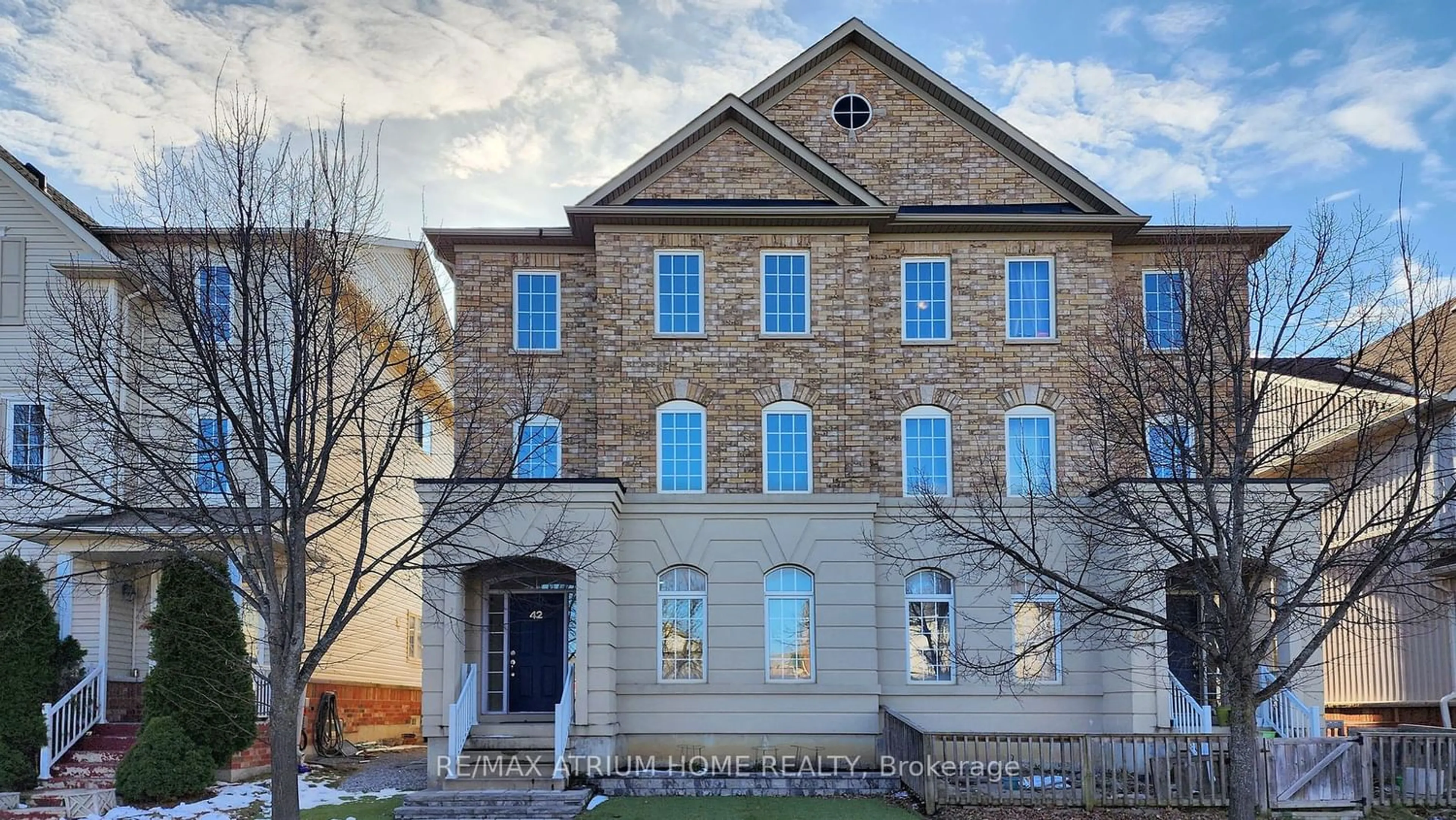 Home with brick exterior material for 42 Innisvale Dr, Markham Ontario L6B 1G6