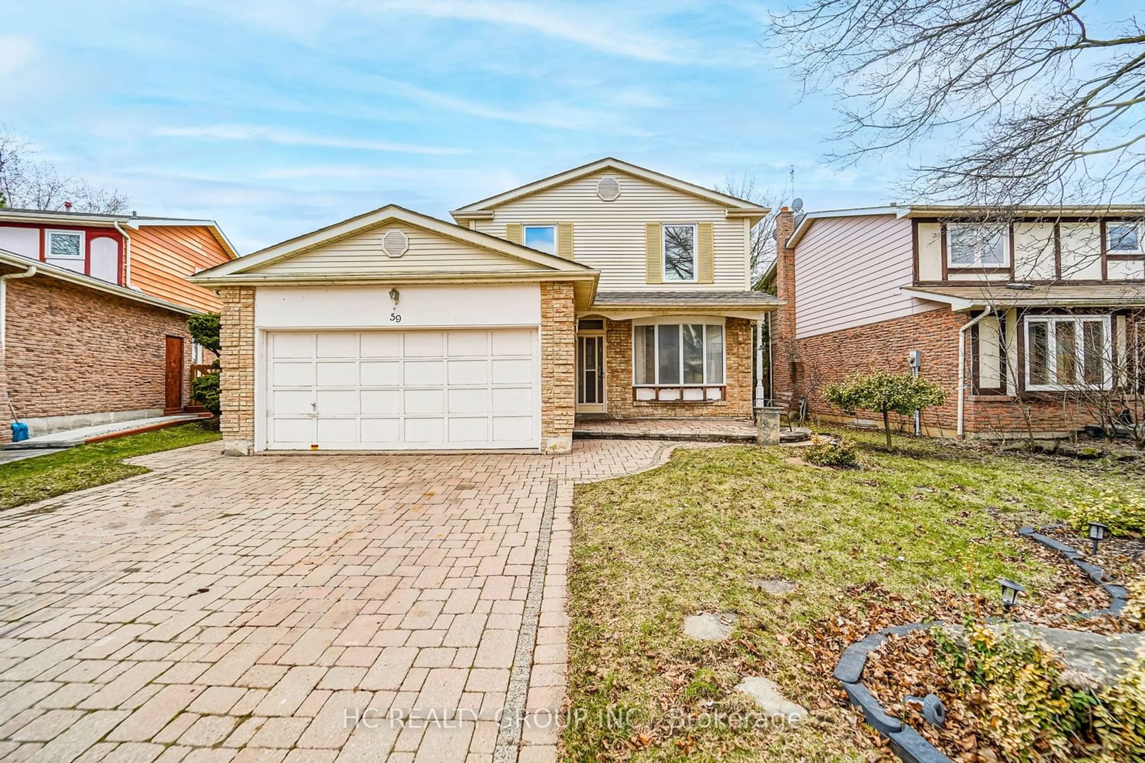Home with brick exterior material for 59 Braeburn Dr, Markham Ontario L3T 4W7
