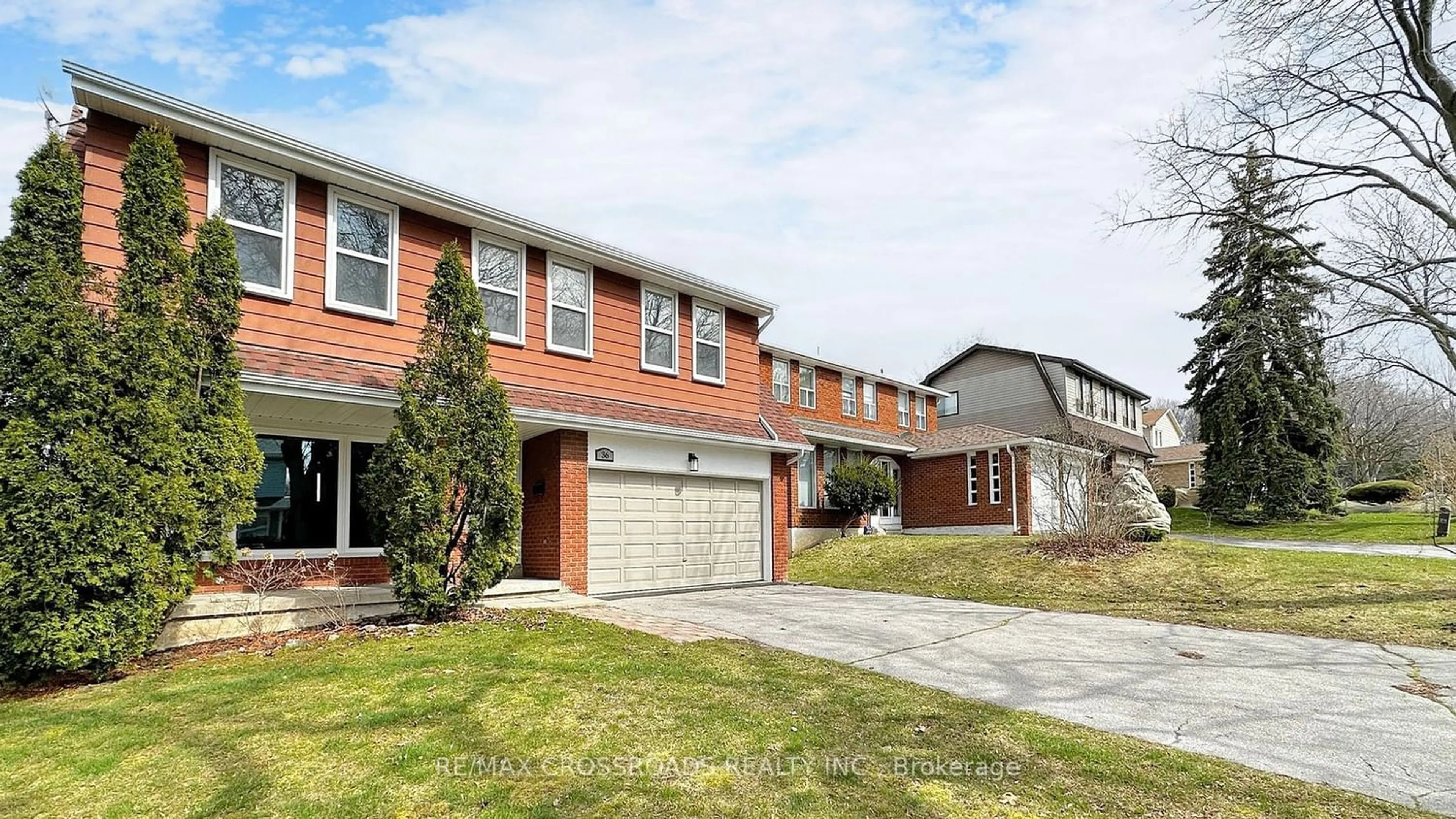 Home with brick exterior material for 36 Flowervale Rd, Markham Ontario L3T 4J4