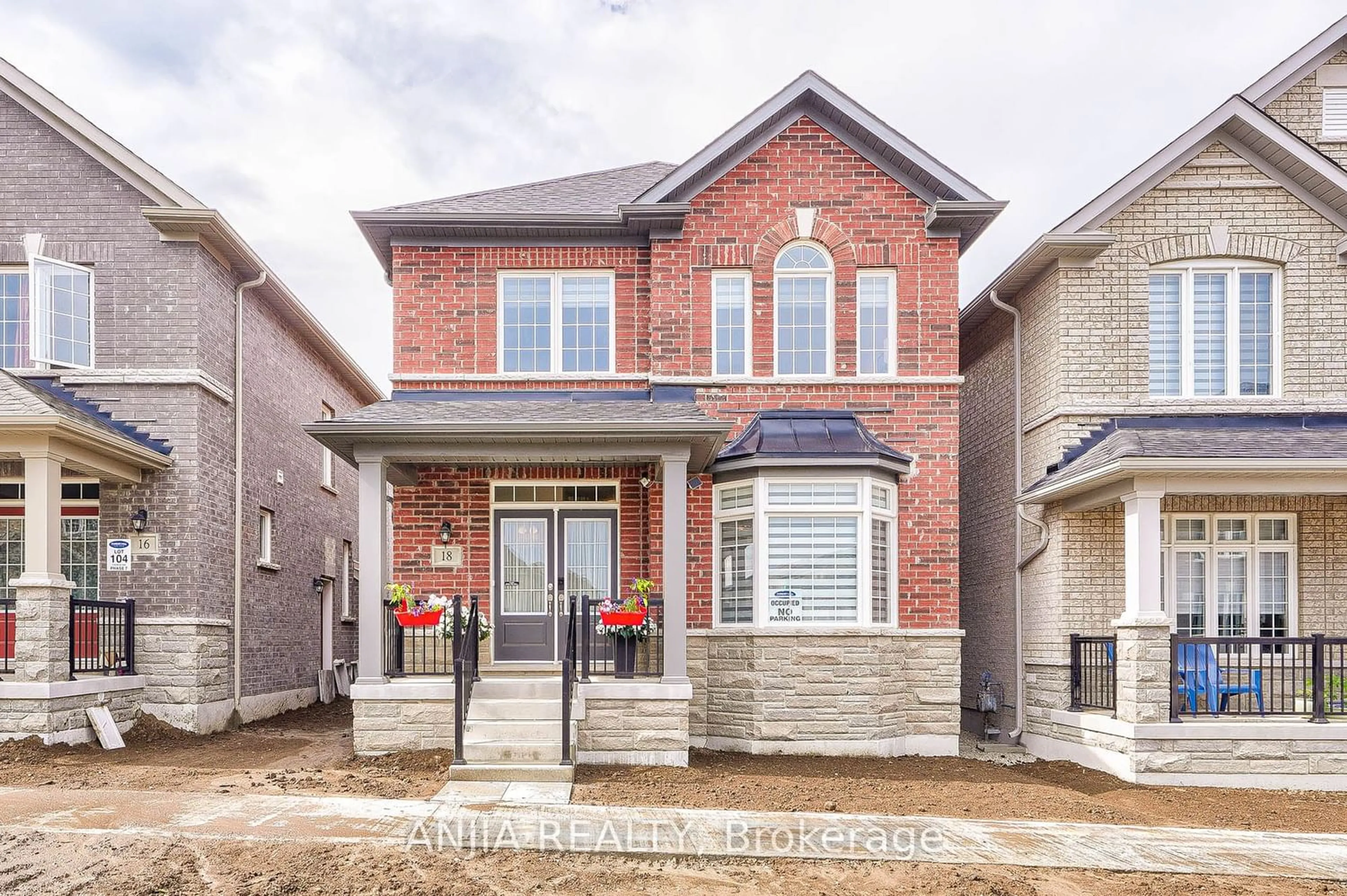 Home with brick exterior material for 18 Waterleaf Rd, Markham Ontario L6B 1N9
