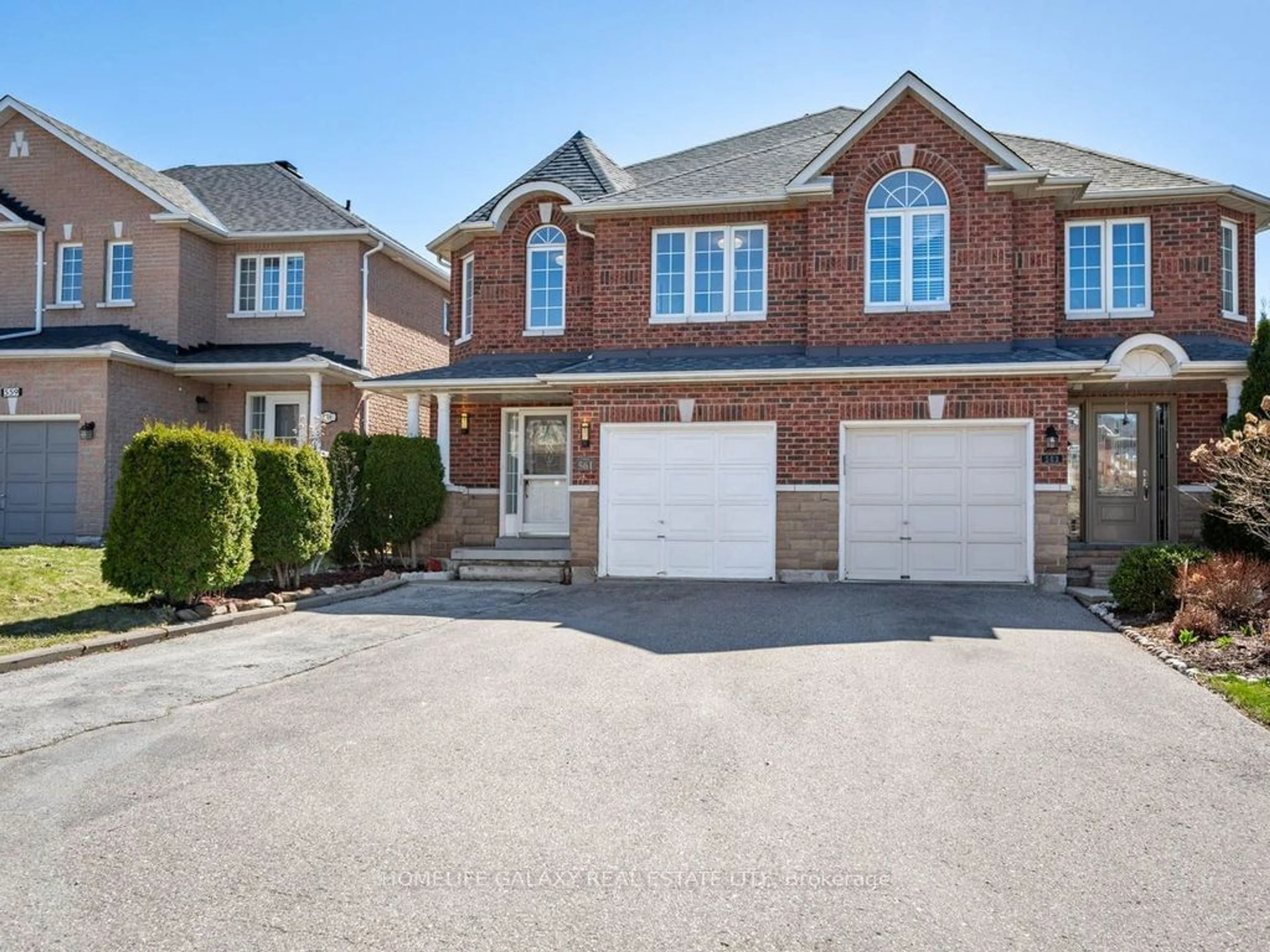 Home with brick exterior material for 561 Heddle Cres, Newmarket Ontario L3X 2K7