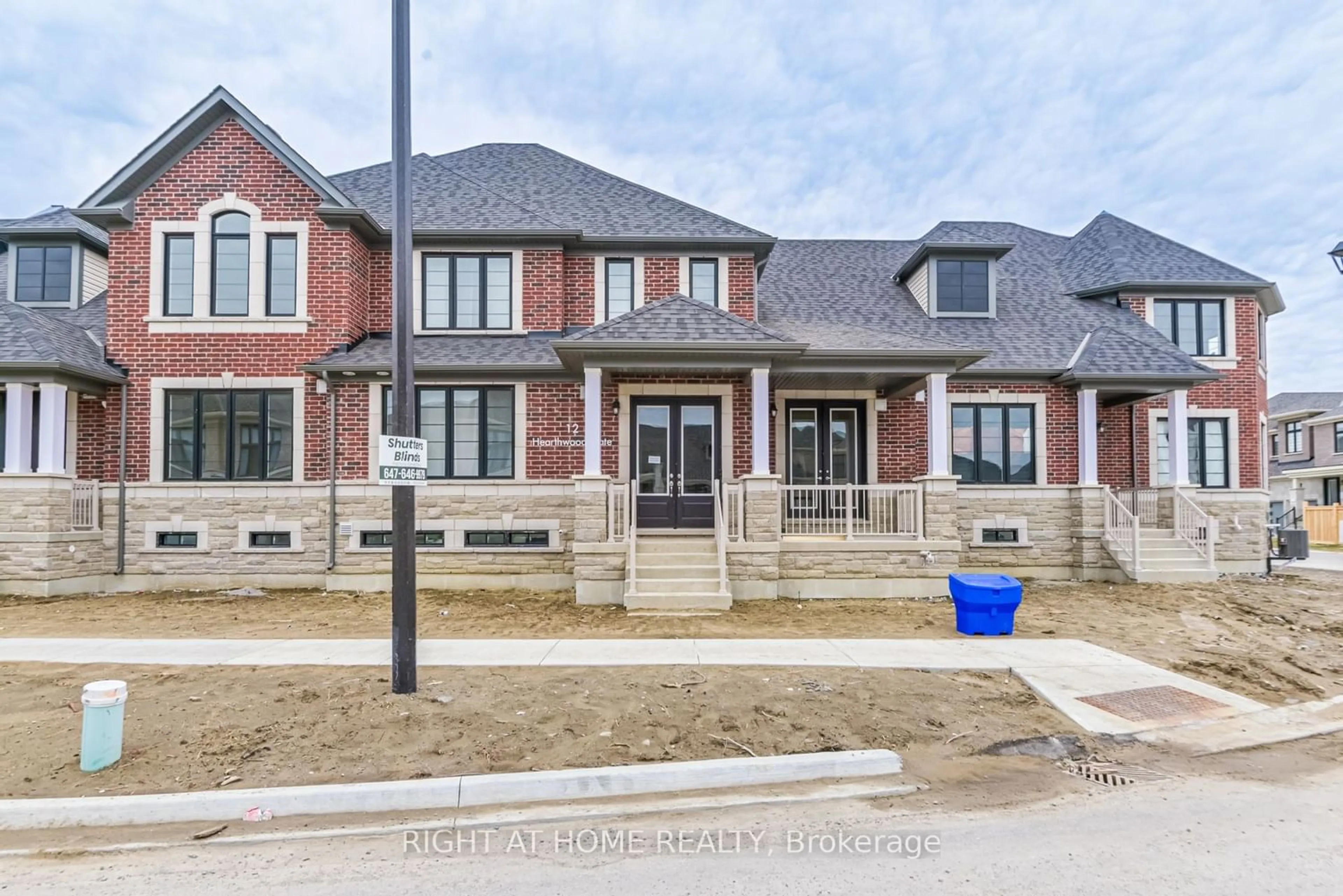 Home with brick exterior material for 12 Hearthwood Gate, Whitchurch-Stouffville Ontario L4A 4X1