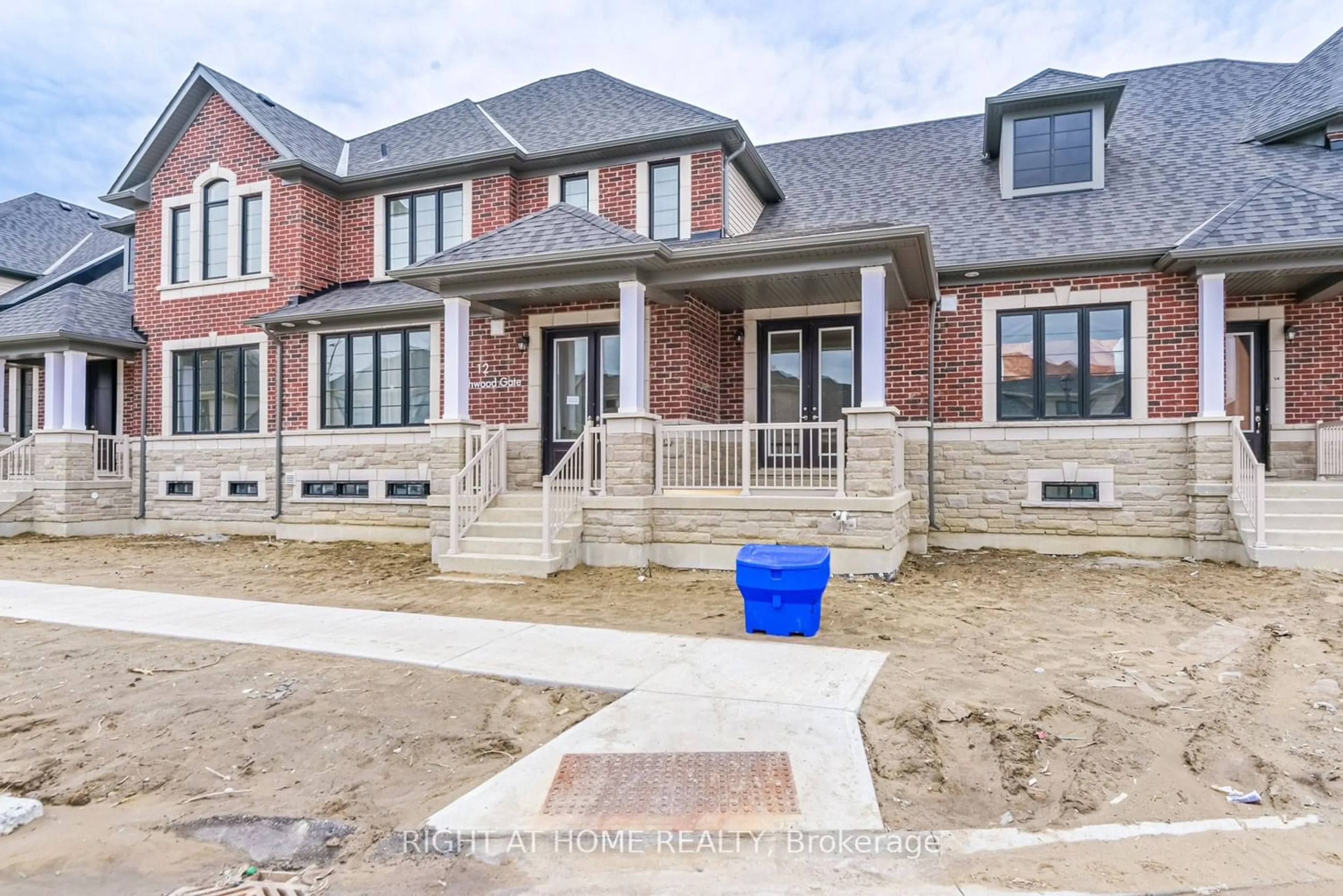 Home with brick exterior material for 12 Hearthwood Gate, Whitchurch-Stouffville Ontario L4A 4X1