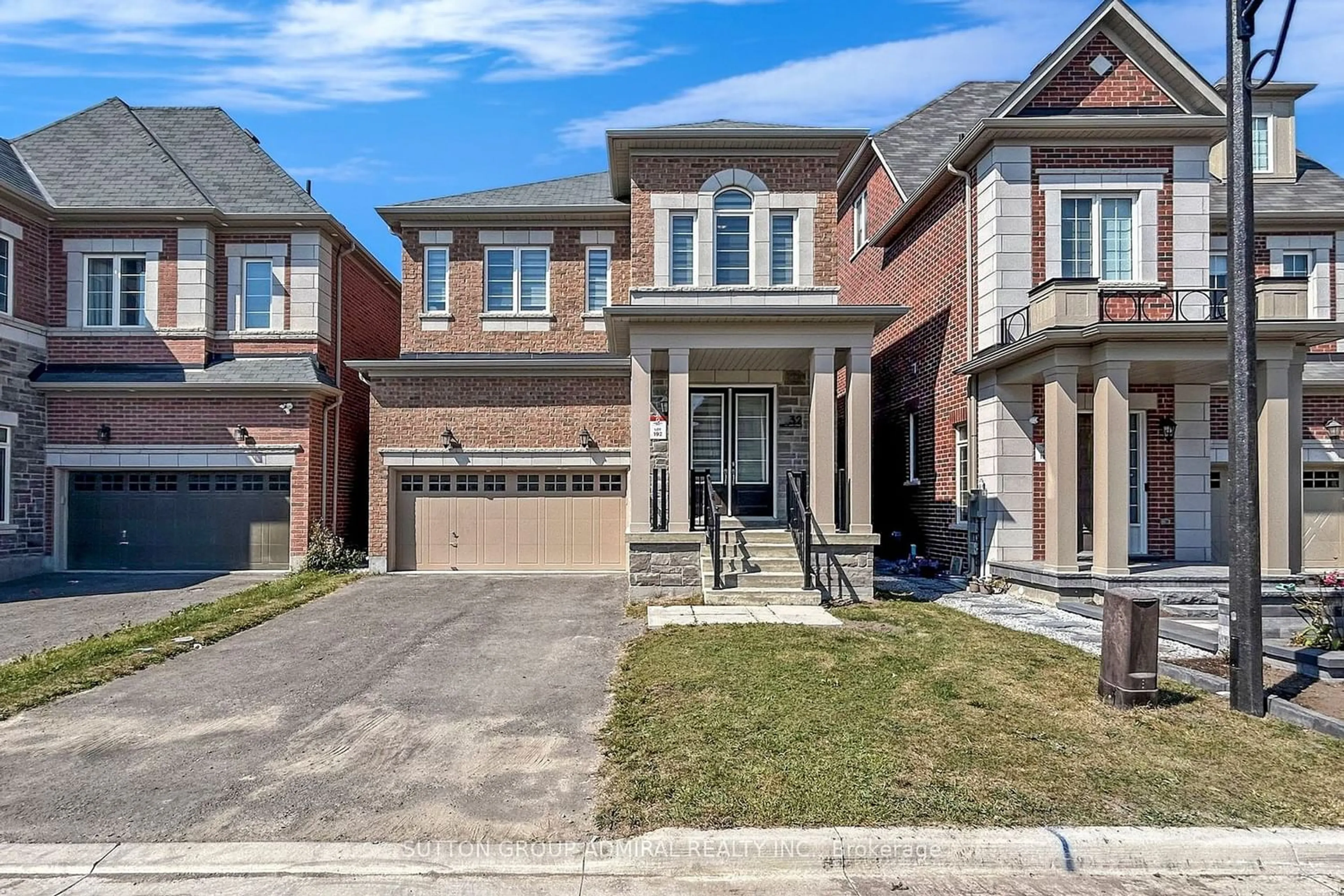 Home with brick exterior material for 32 Red Giant St, Richmond Hill Ontario L4C 4Y4
