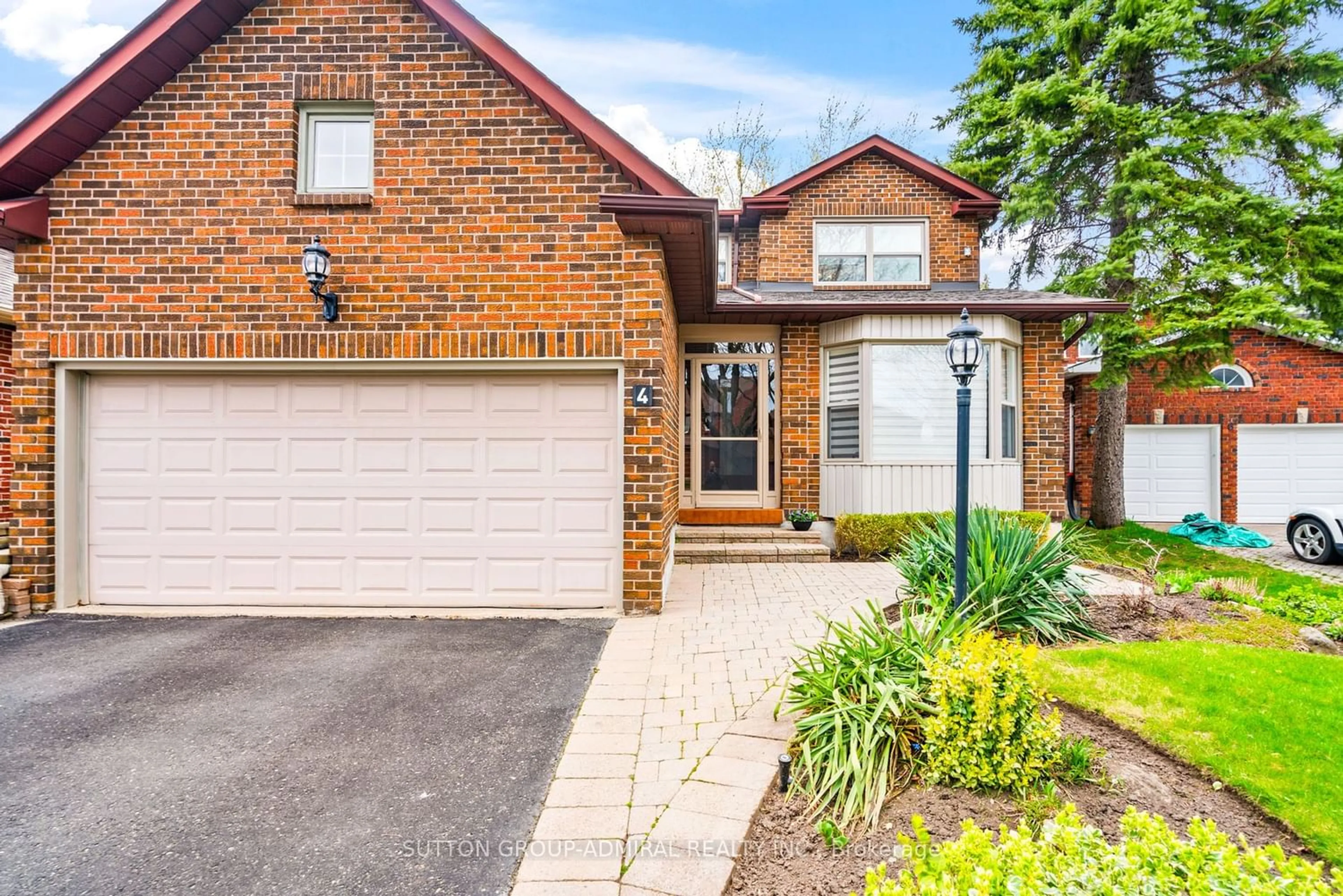 Home with brick exterior material for 4 Parklawn Cres, Markham Ontario L3T 6X1