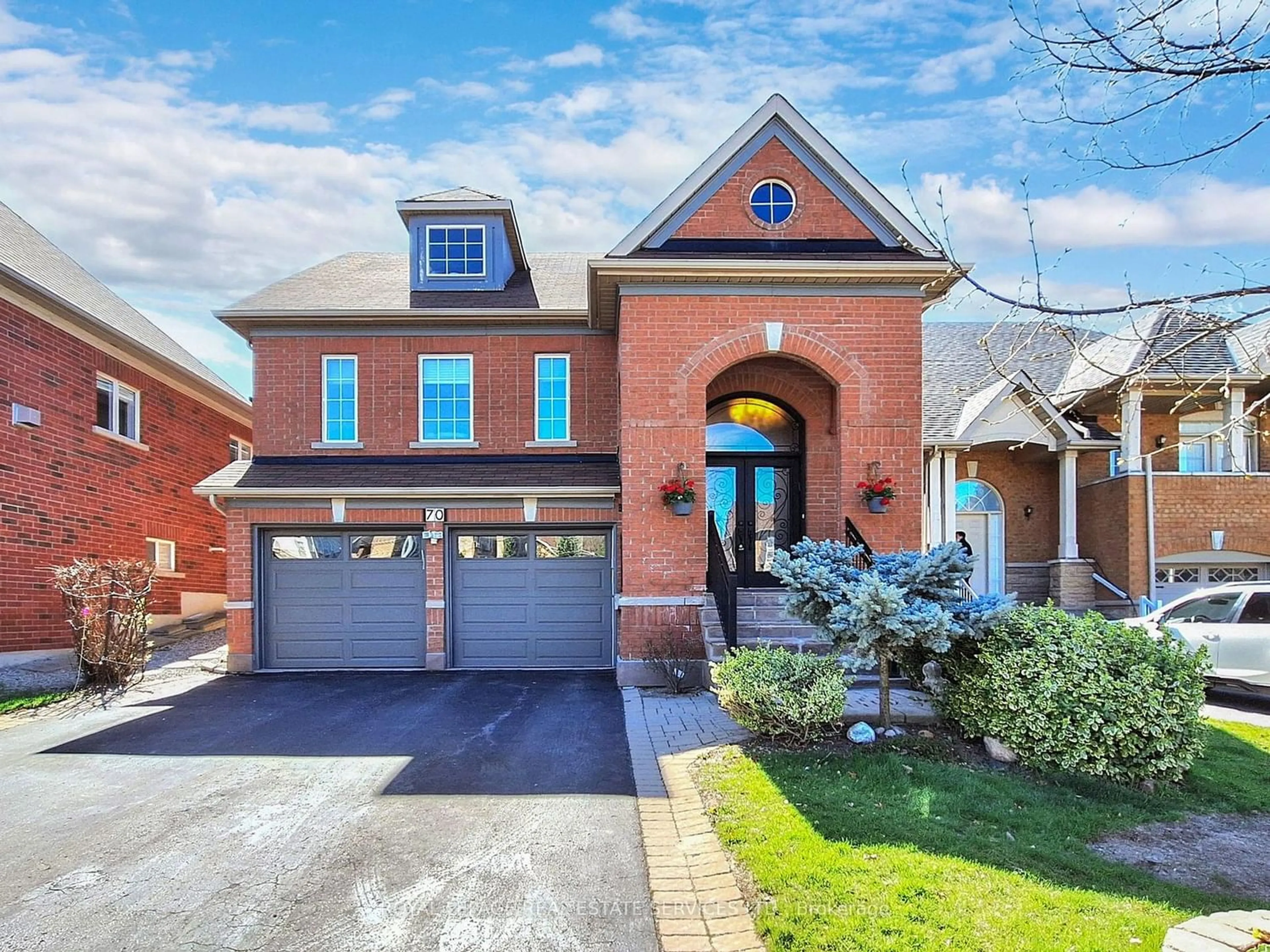 Home with brick exterior material for 70 Sandwood Dr, Vaughan Ontario L4J 8W4