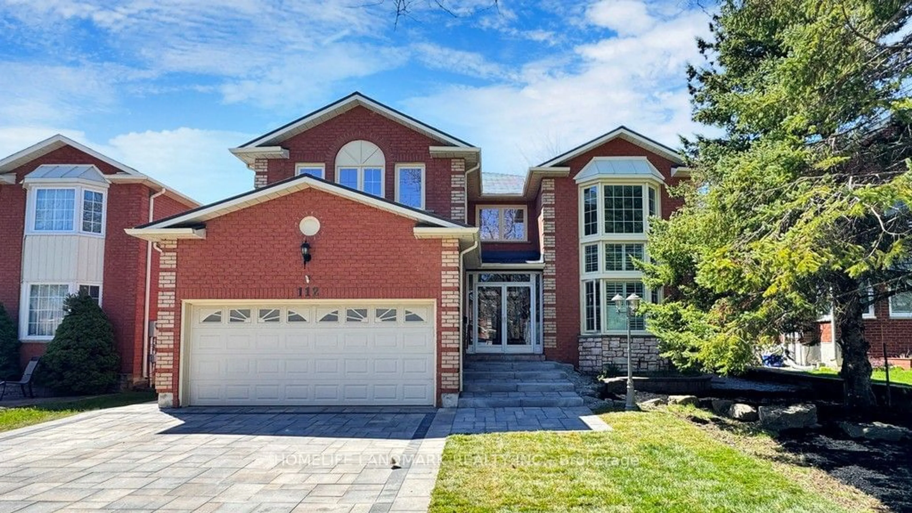 Home with brick exterior material for 112 Fitzgerald Ave, Markham Ontario L3R 9Y9