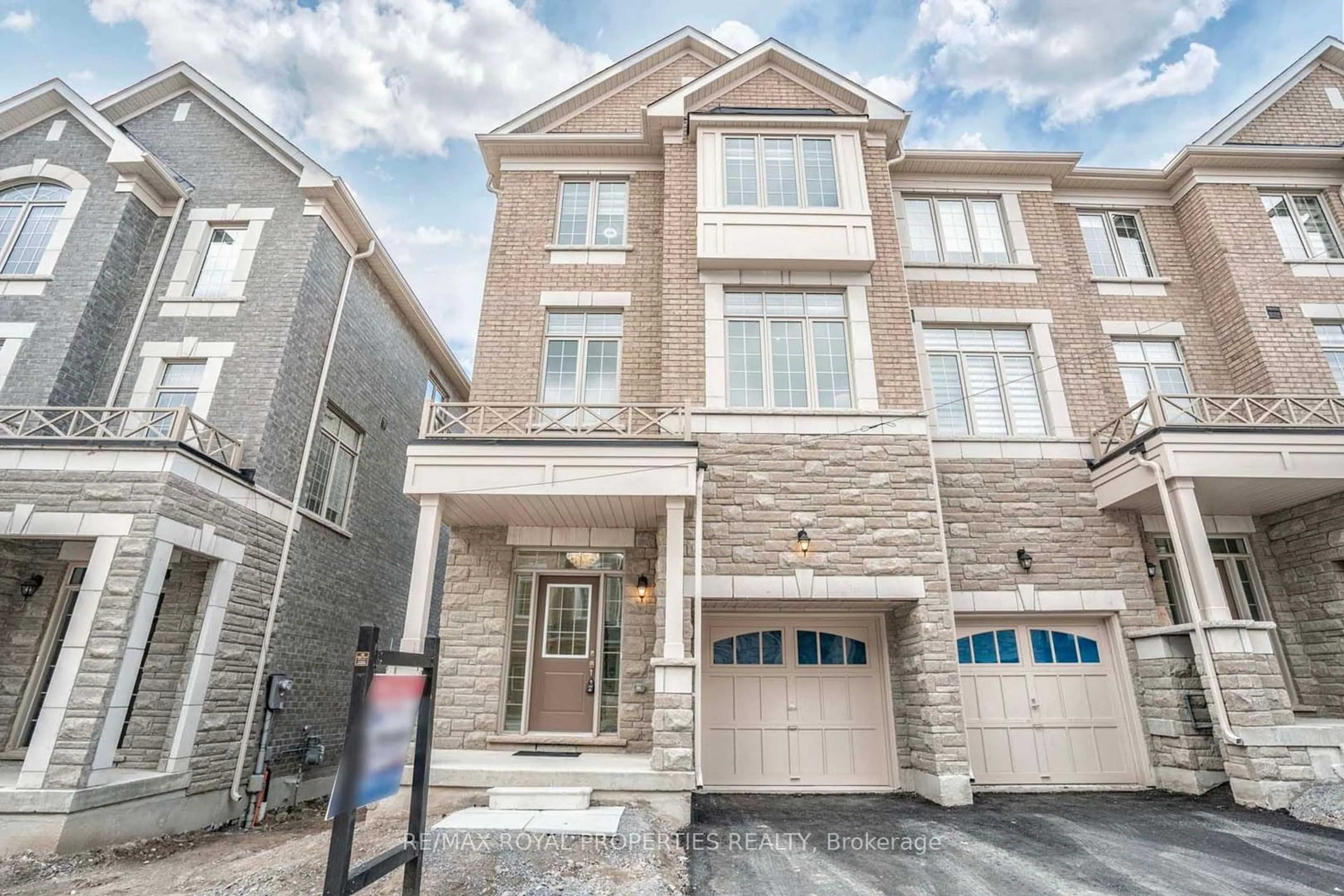 A pic from exterior of the house or condo for 44 Andress Way, Markham Ontario L3S 2J5