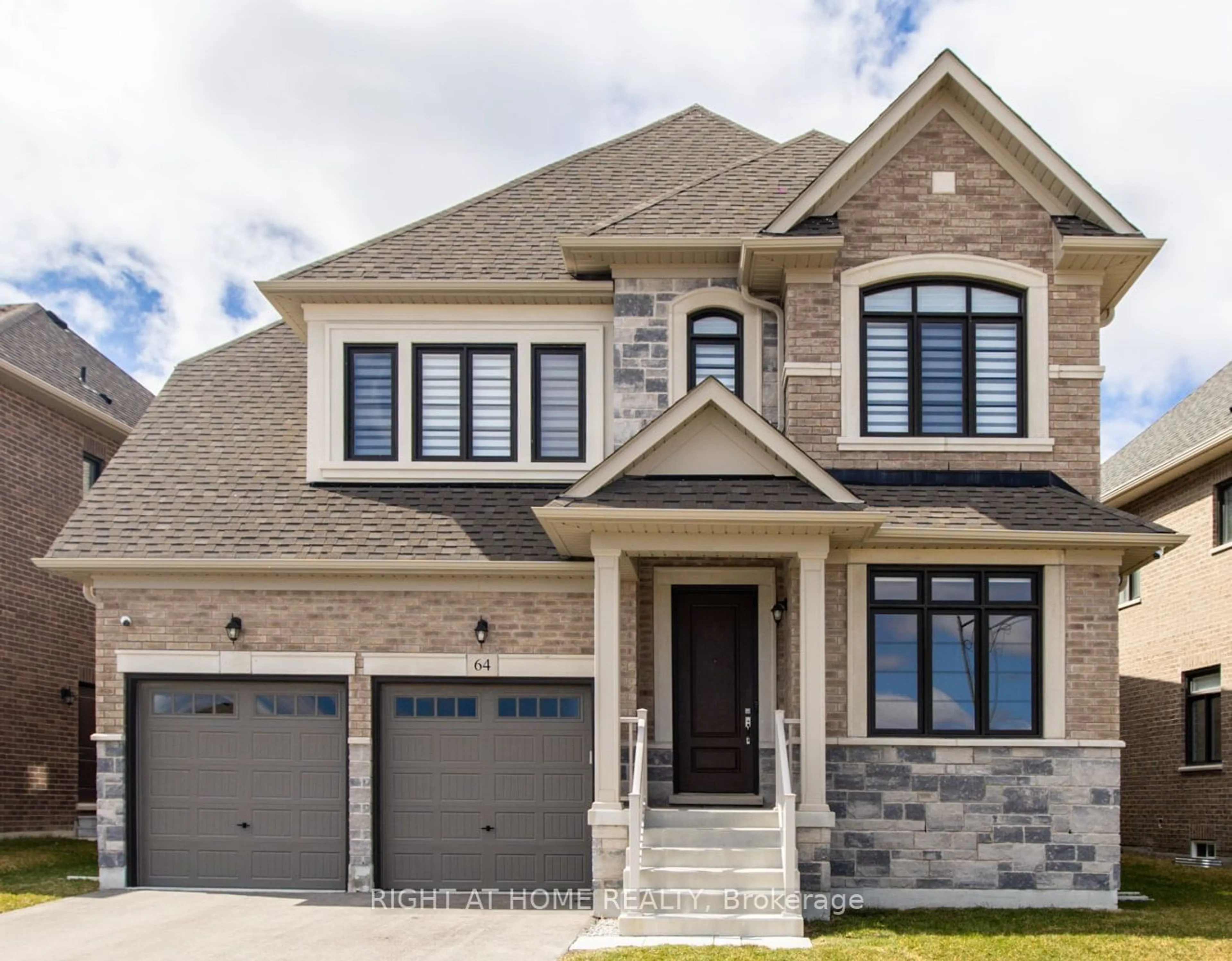 Home with brick exterior material for 64 Dog Wood Blvd, East Gwillimbury Ontario L9N 0T3