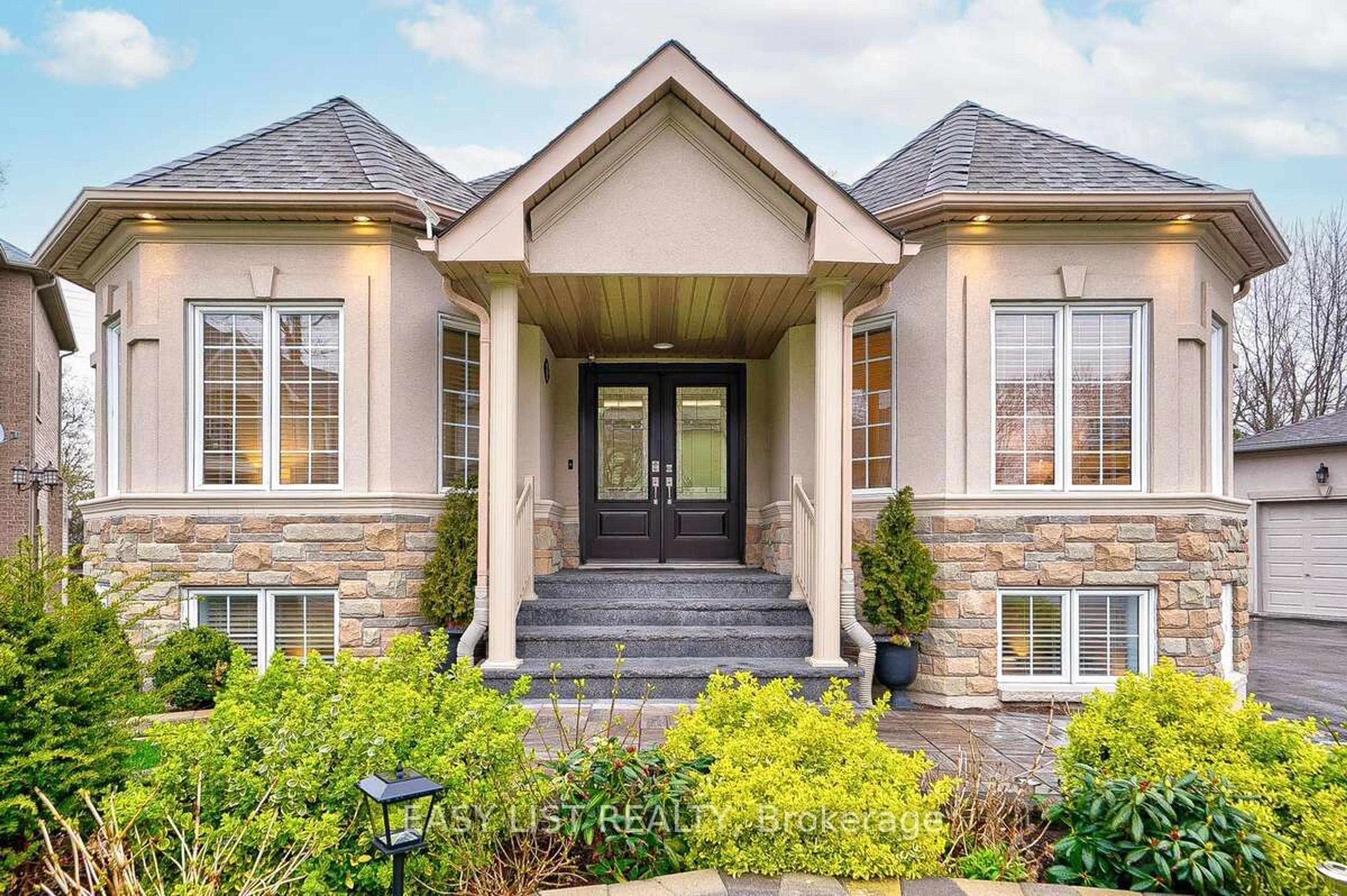 Home with brick exterior material for 32 Warden Woods Crt, Markham Ontario L3R 5W5
