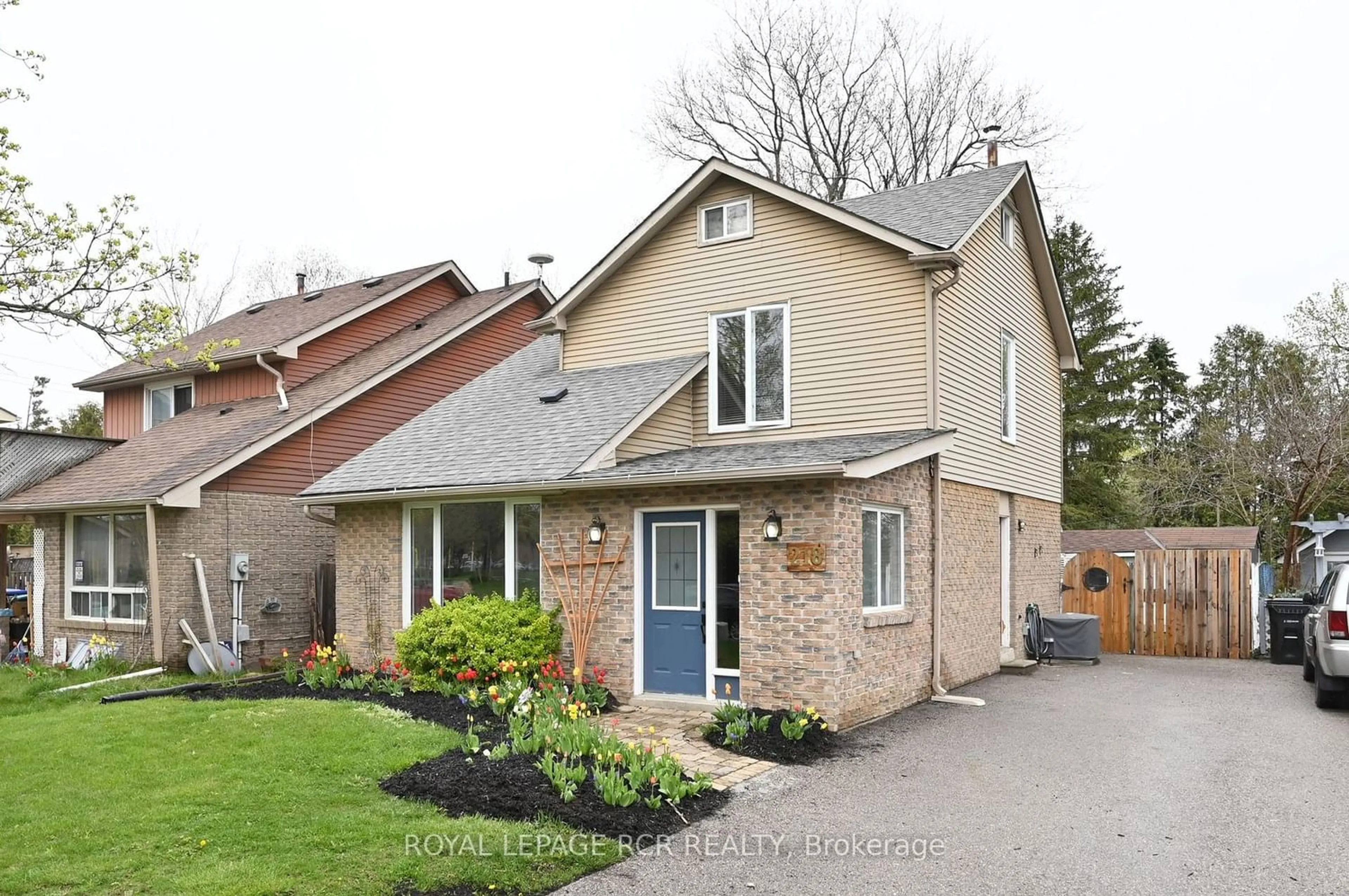 Frontside or backside of a home for 218 Beattie Ave, New Tecumseth Ontario L9R 1B9