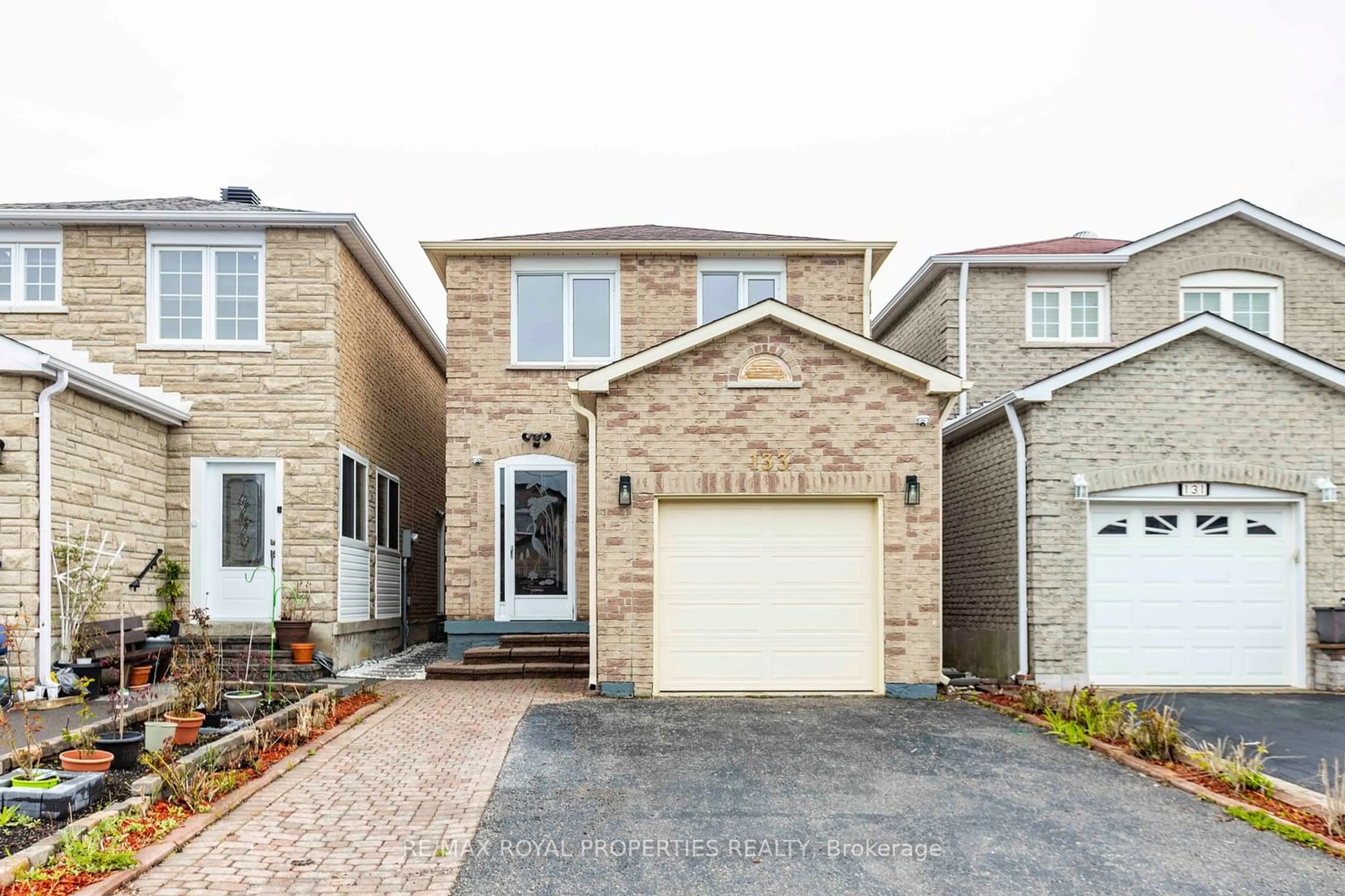 Frontside or backside of a home for 133 Terrosa Rd, Markham Ontario L3S 2R1
