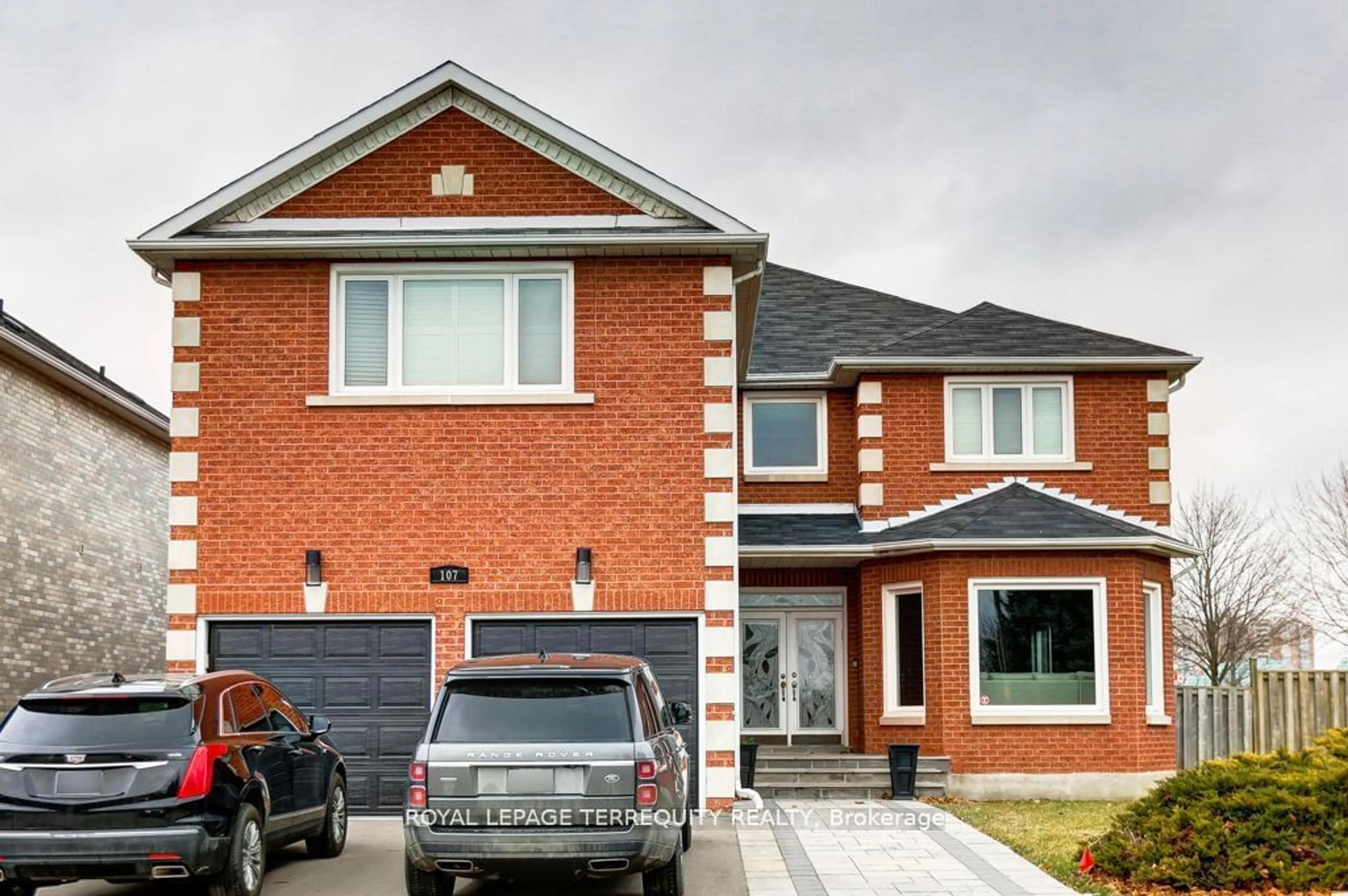 Home with brick exterior material for 107 Thornbrook Crt, Vaughan Ontario L4J 7X4