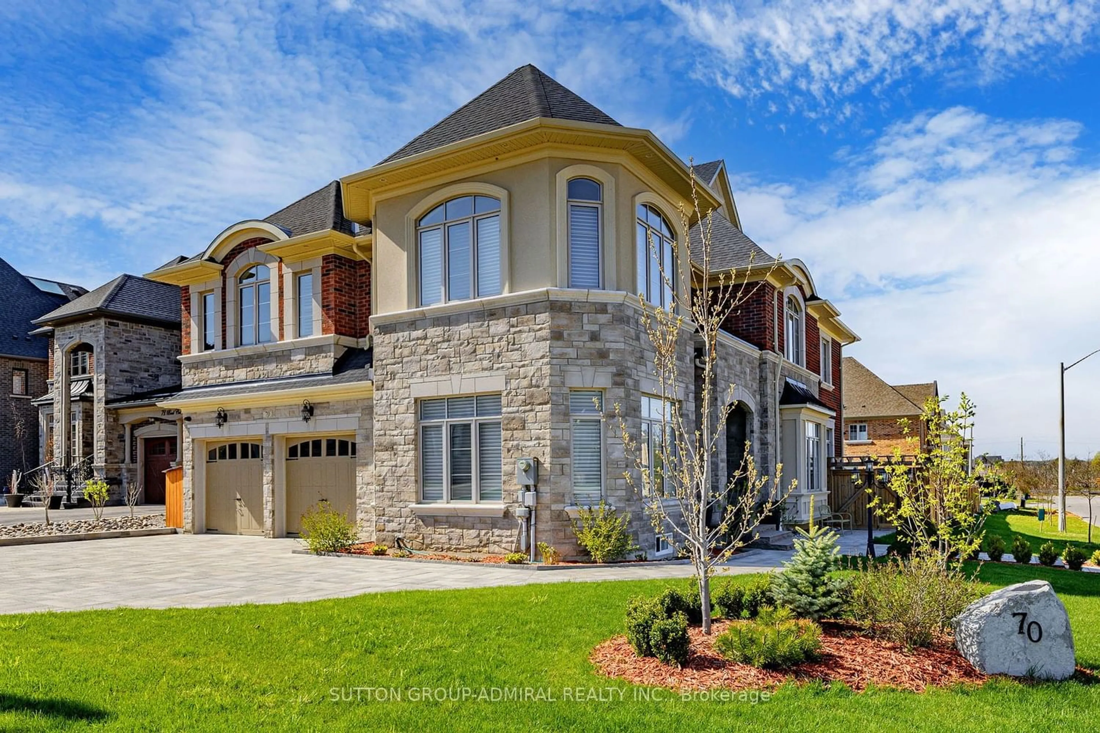 Home with brick exterior material for 70 Bond Cres, Richmond Hill Ontario L4E 3K4