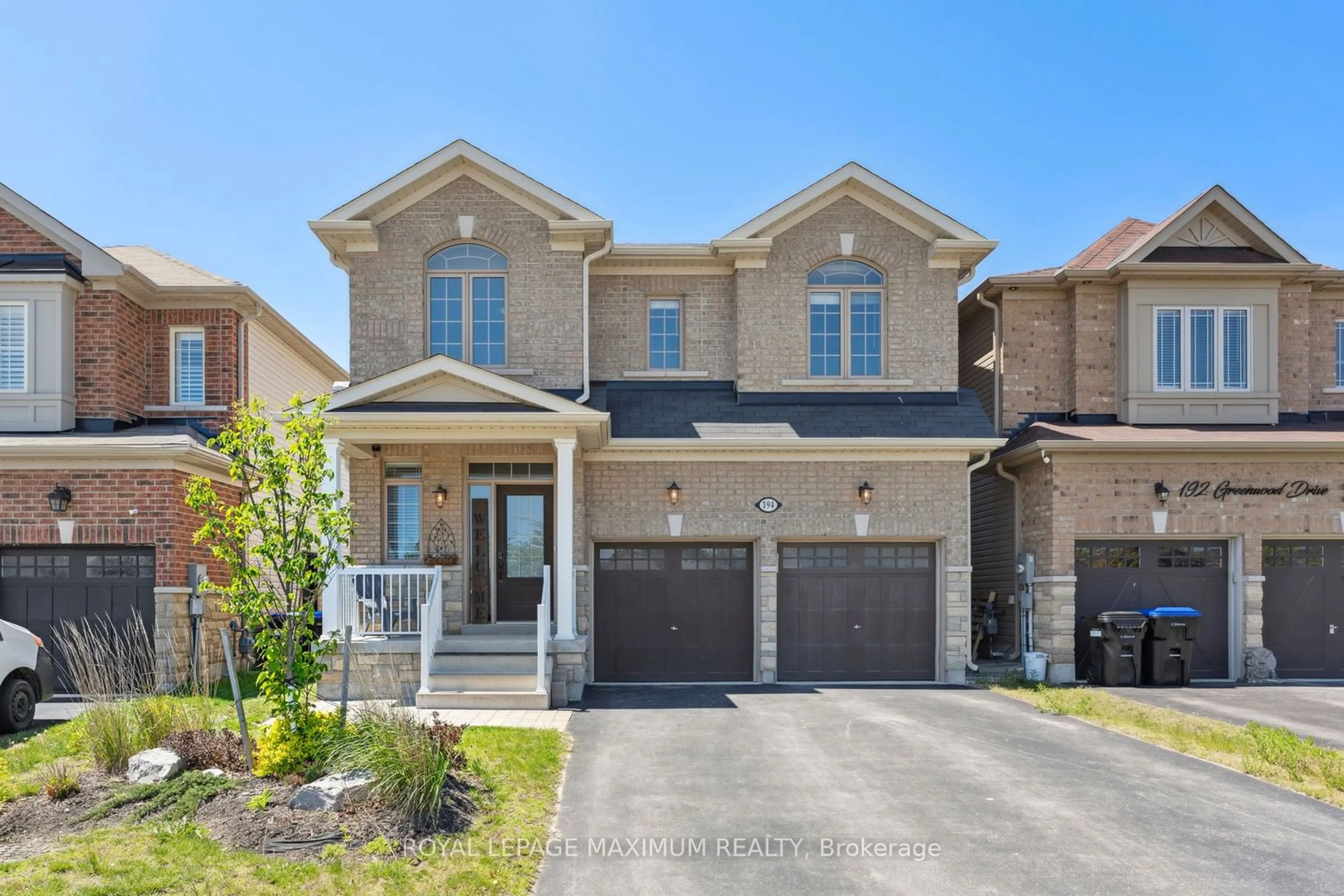 Home with brick exterior material for 194 Greenwood Dr, Essa Ontario L0M 1B4