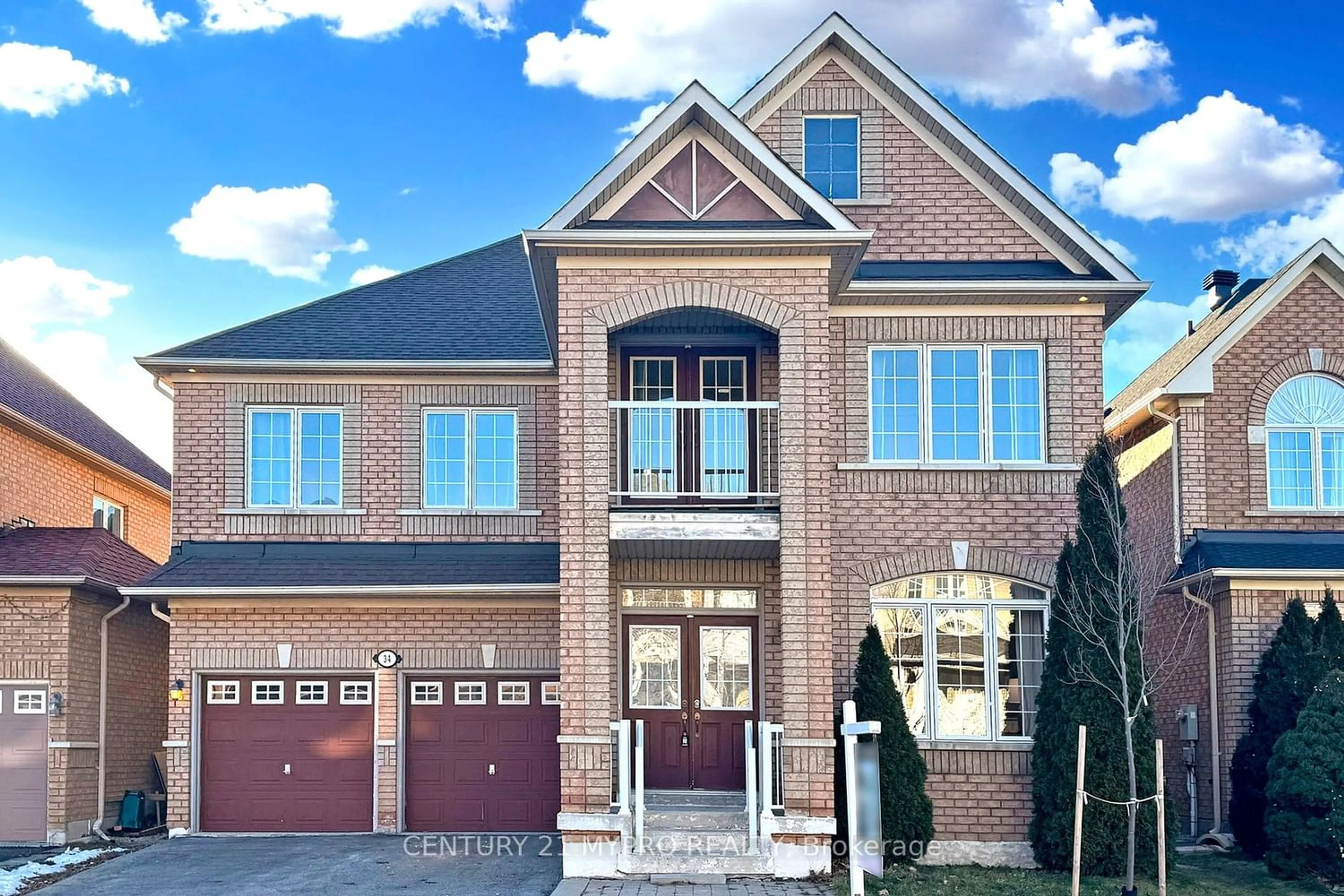 Home with brick exterior material for 34 Ayhart St, Markham Ontario L6E 1H5