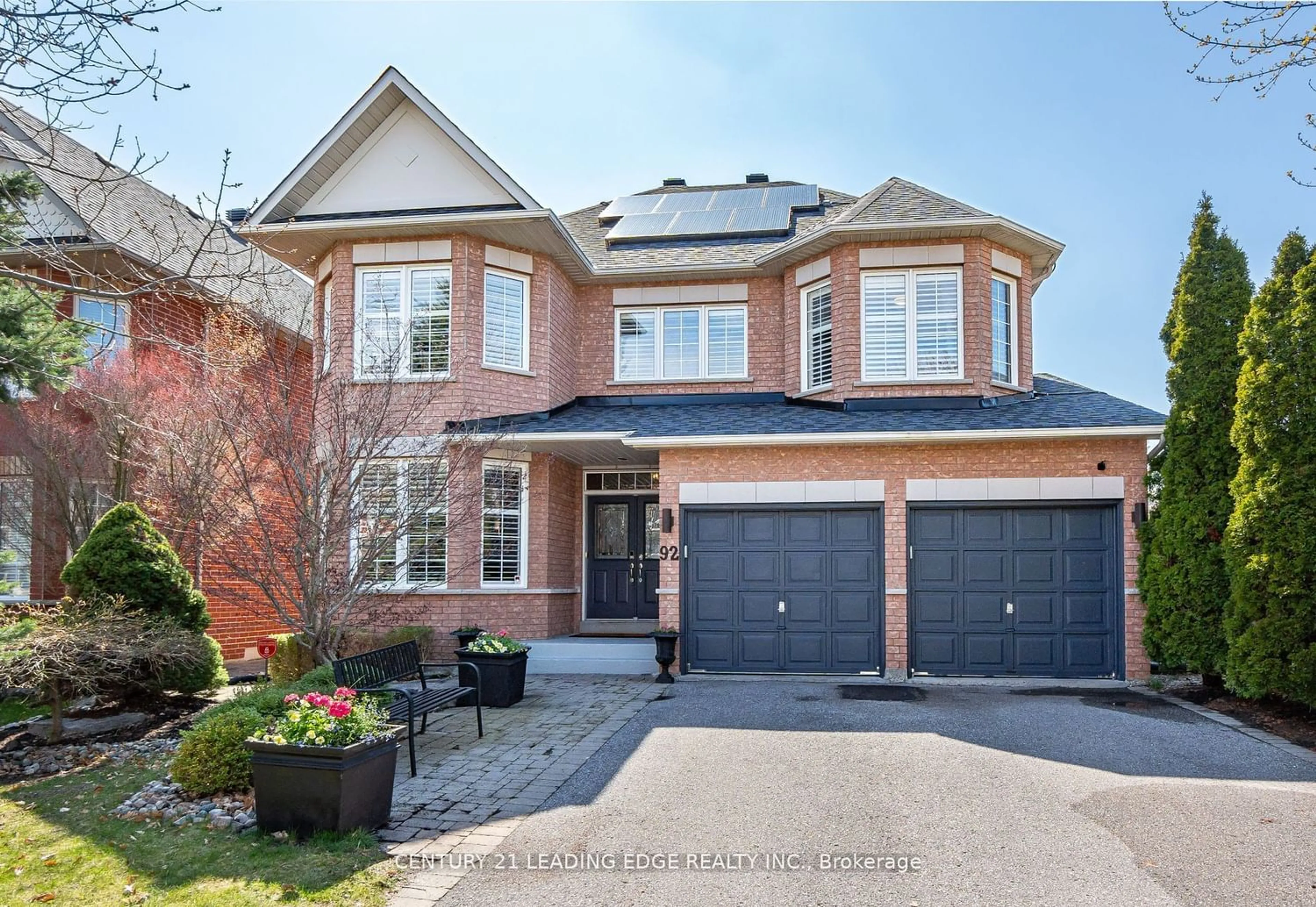 Home with brick exterior material for 92 Red Ash Dr, Markham Ontario L3S 4L2