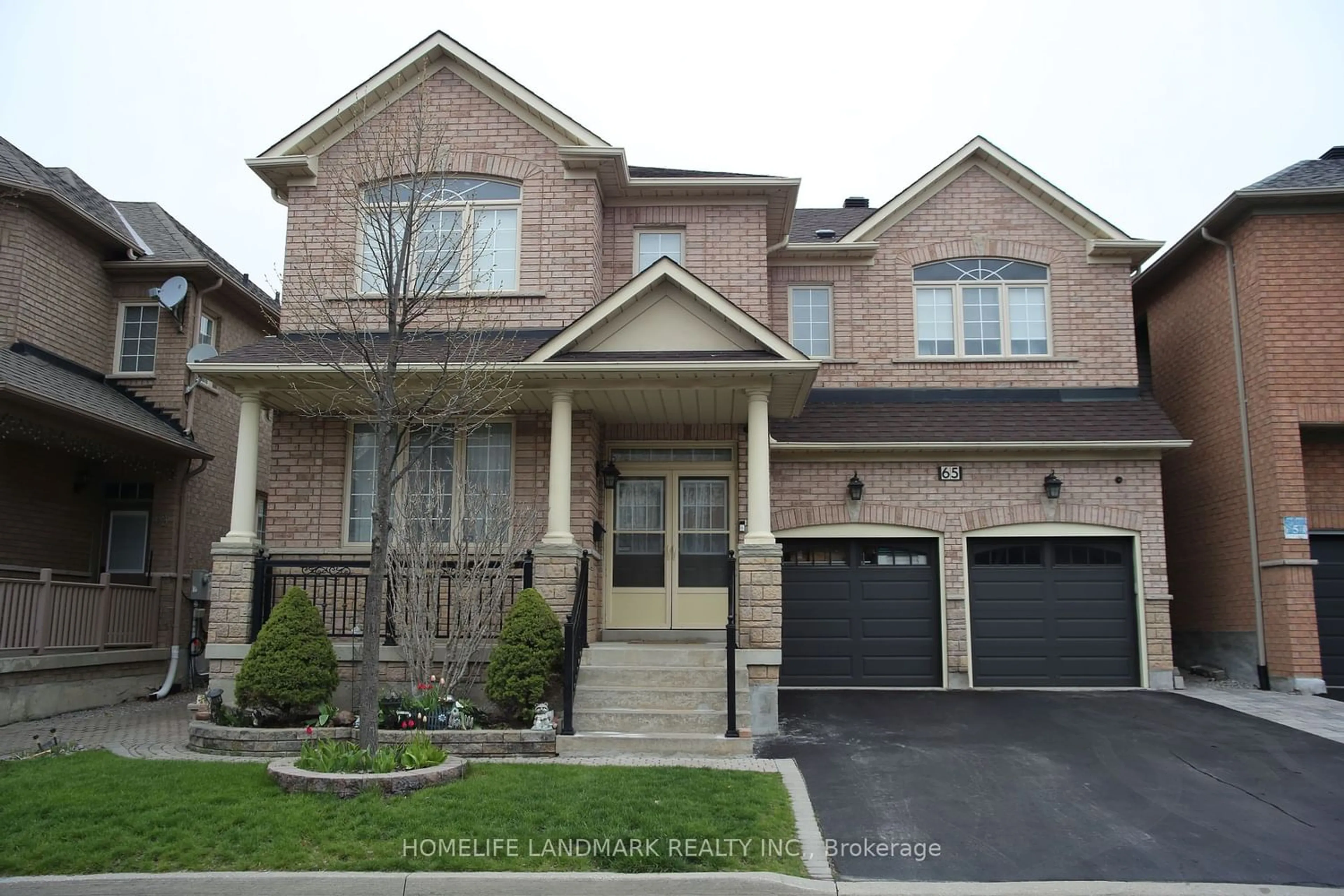 Home with brick exterior material for 65 Lakespring Dr, Markham Ontario L6C 2Z1