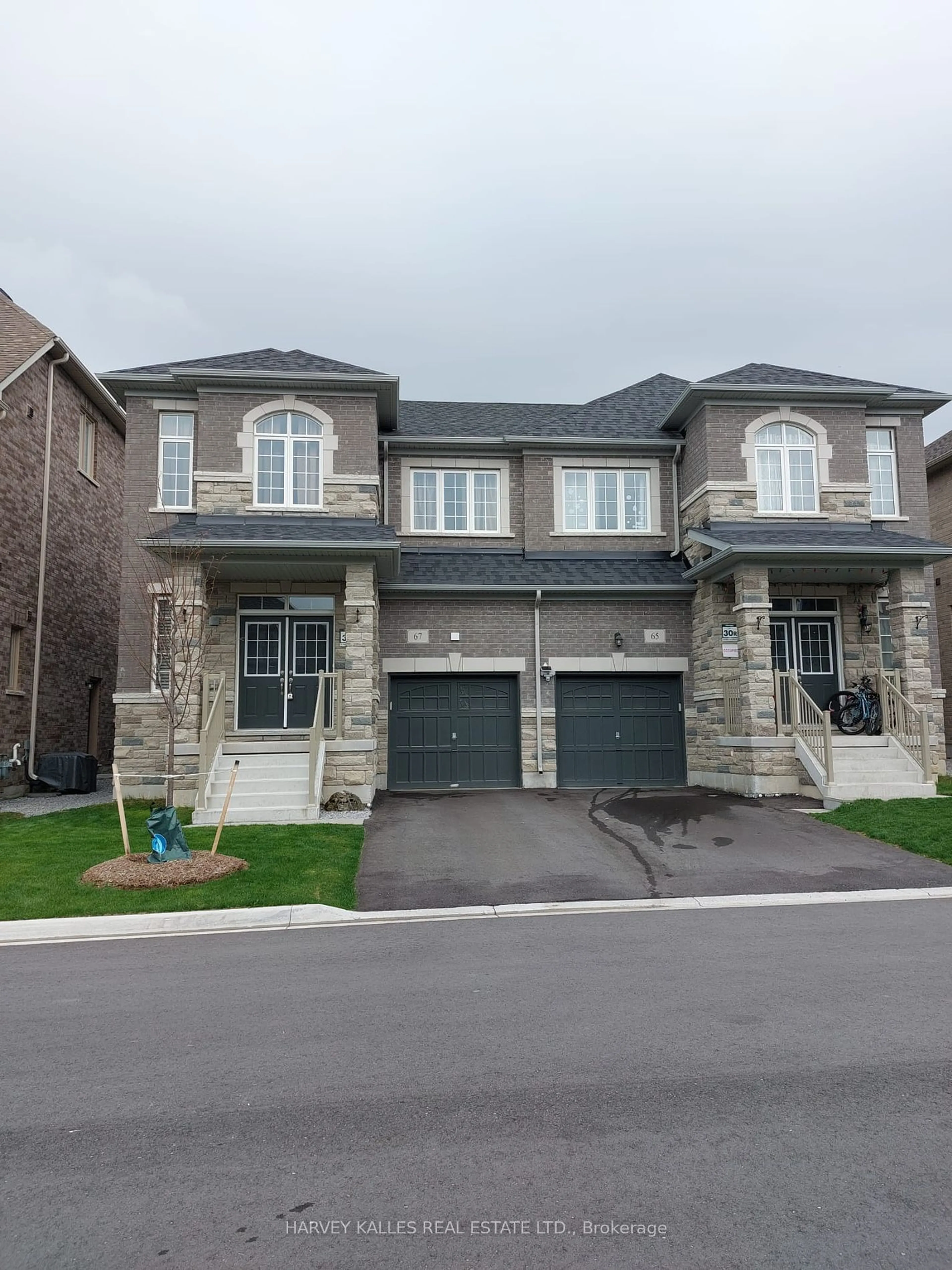 Frontside or backside of a home for 67 Crofting Cres, Markham Ontario L6E 0W1