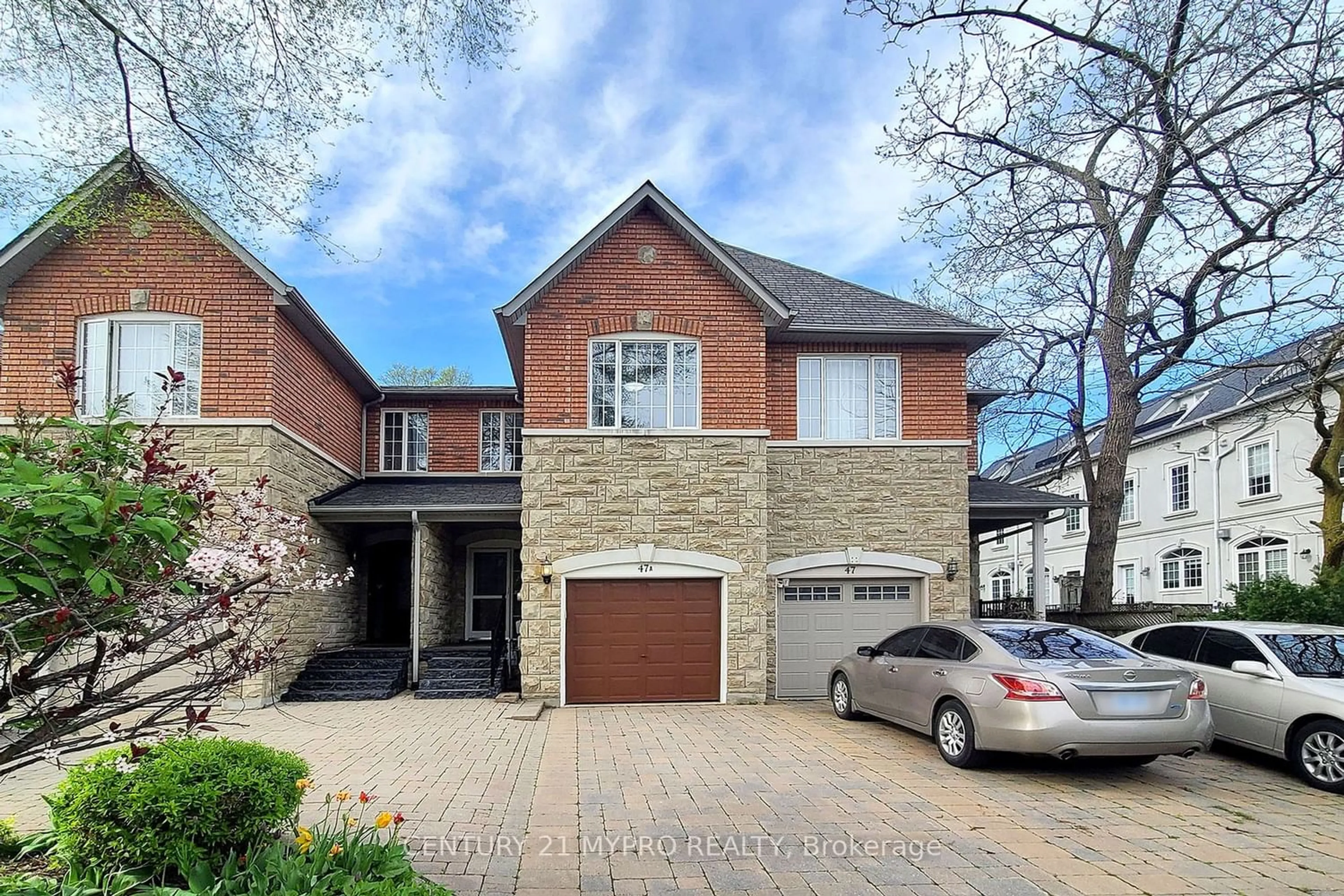 Home with brick exterior material for 47A Benson Ave, Richmond Hill Ontario L4C 4E5