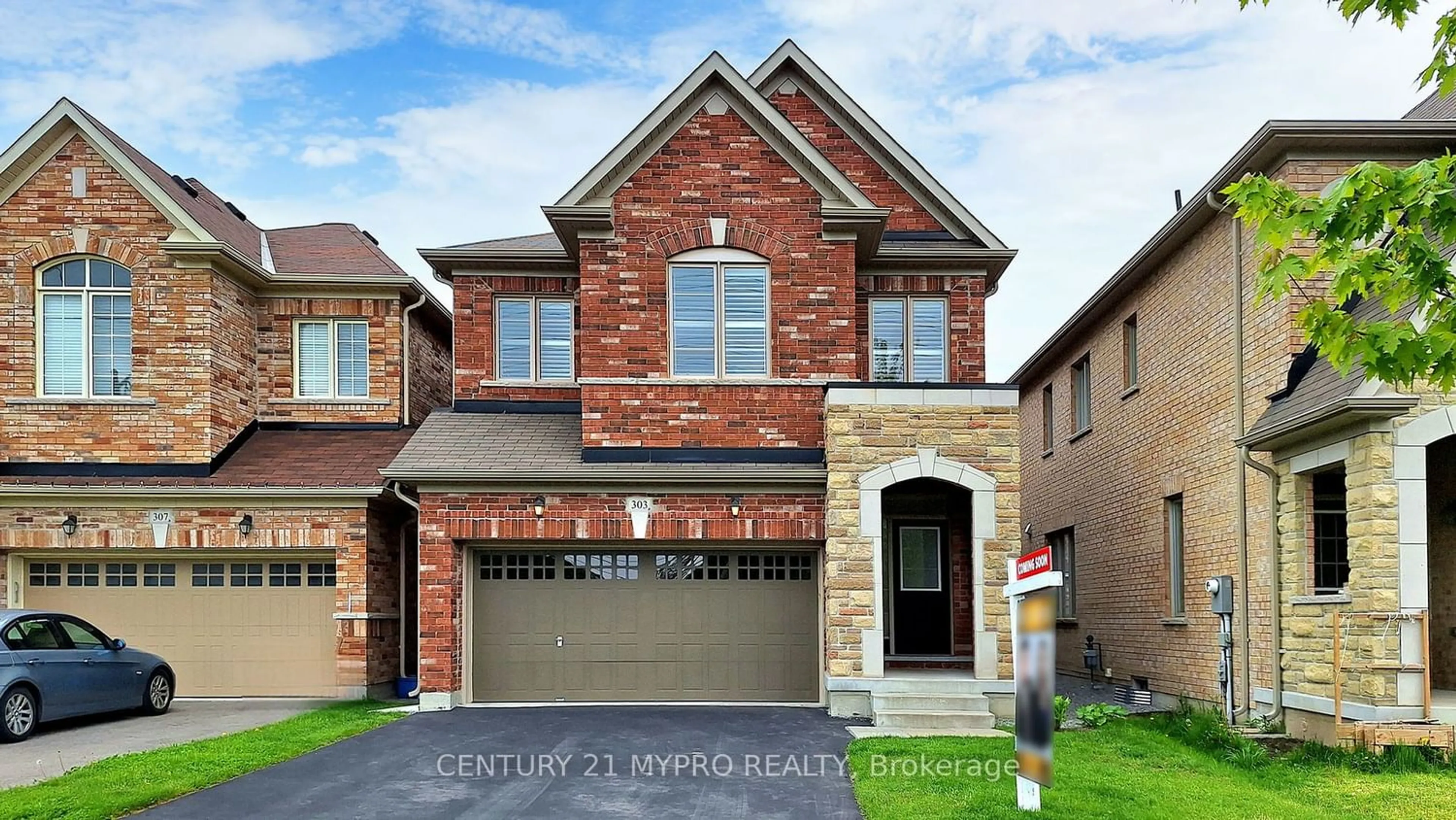 Home with brick exterior material for 303 Chouinard Way, Aurora Ontario L4G 1A6