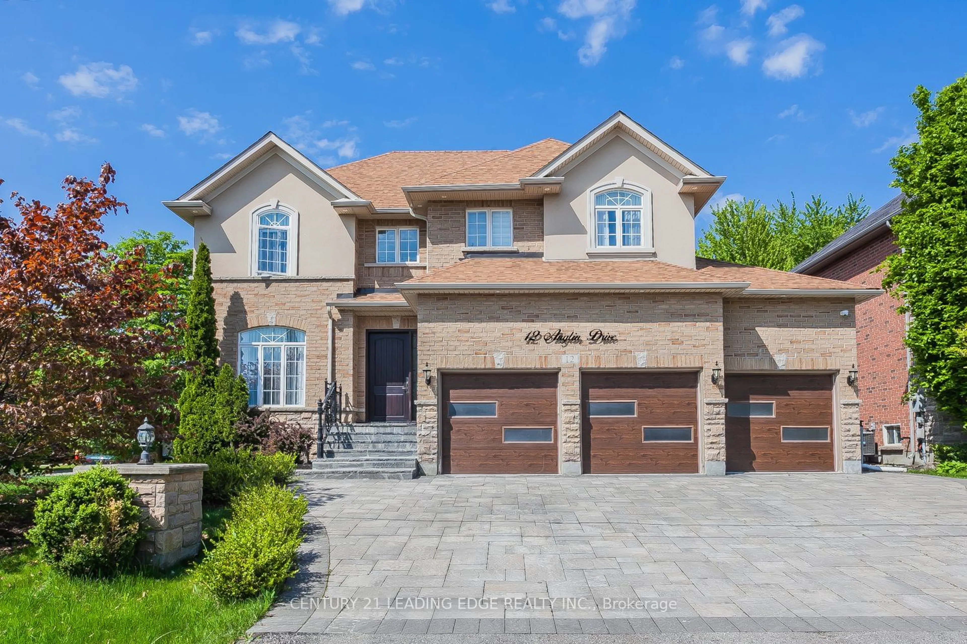 Home with brick exterior material for 12 Anglin Dr, Richmond Hill Ontario L4E 3M5