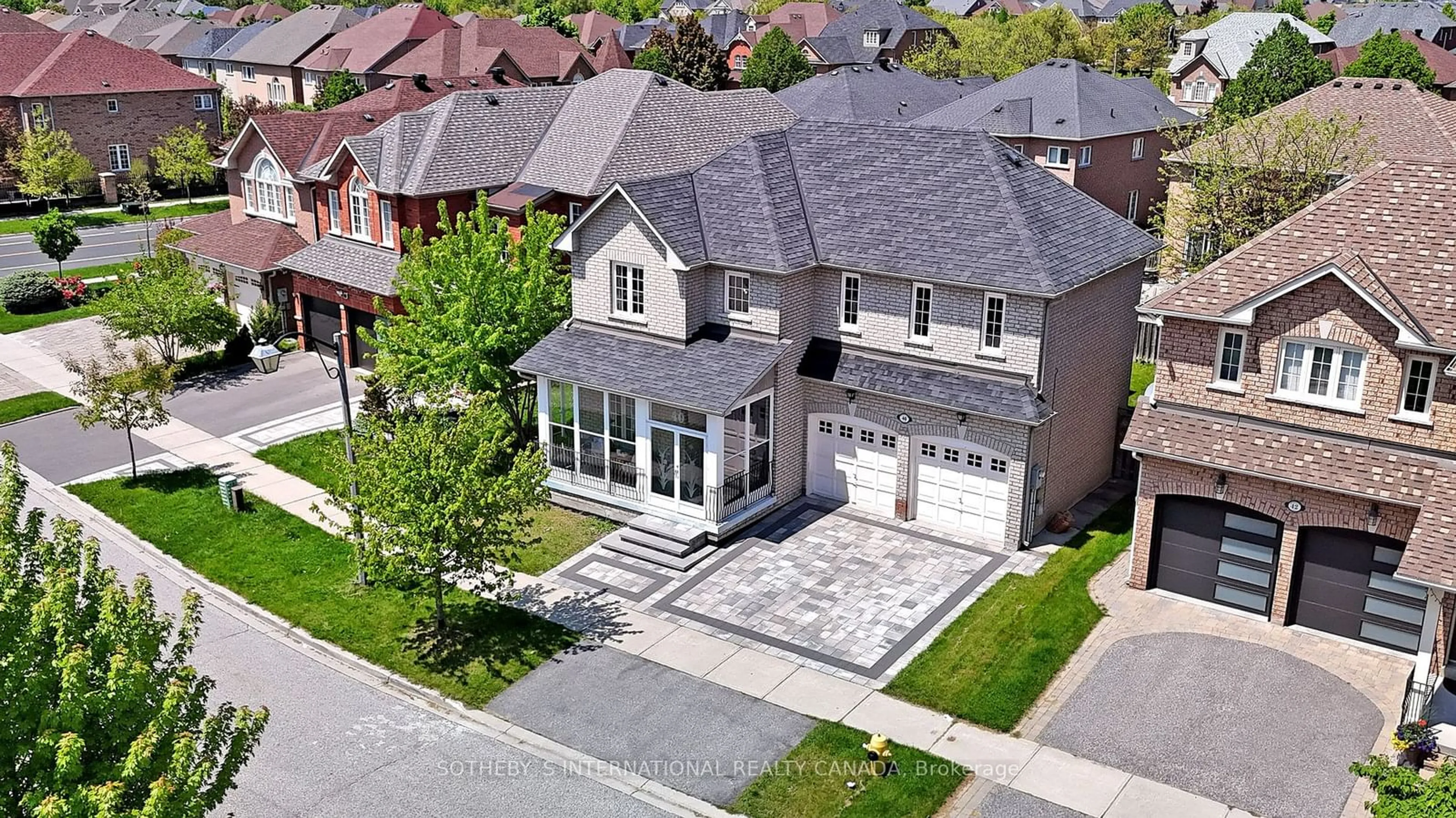 Home with brick exterior material for 40 Briar Path Lane, Markham Ontario L6C 2C8