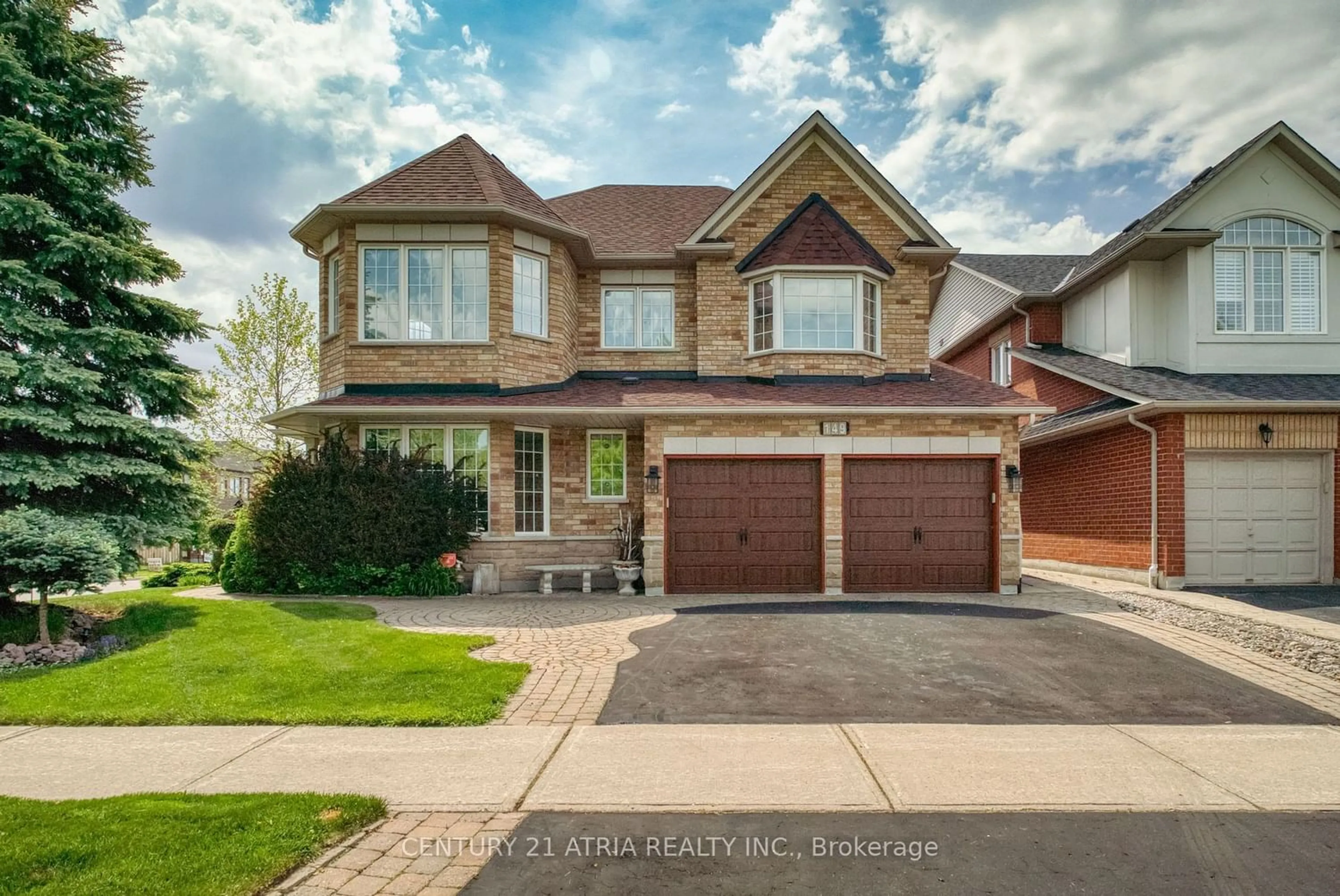 Home with brick exterior material for 149 Russell Jarvis Dr, Markham Ontario L3S 4L1