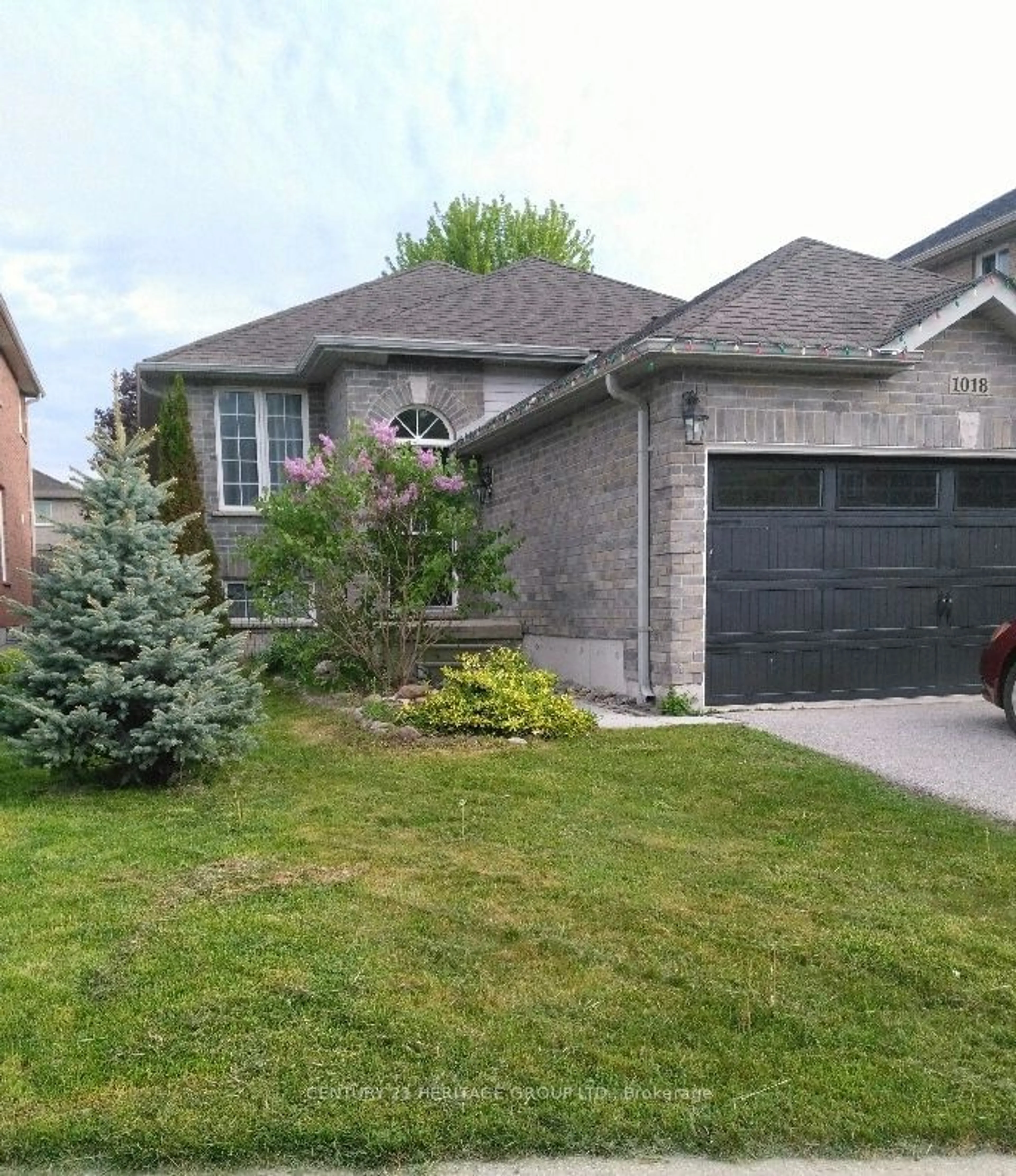 Frontside or backside of a home for 1018 Griggs Rd, Innisfil Ontario L9S 0A6
