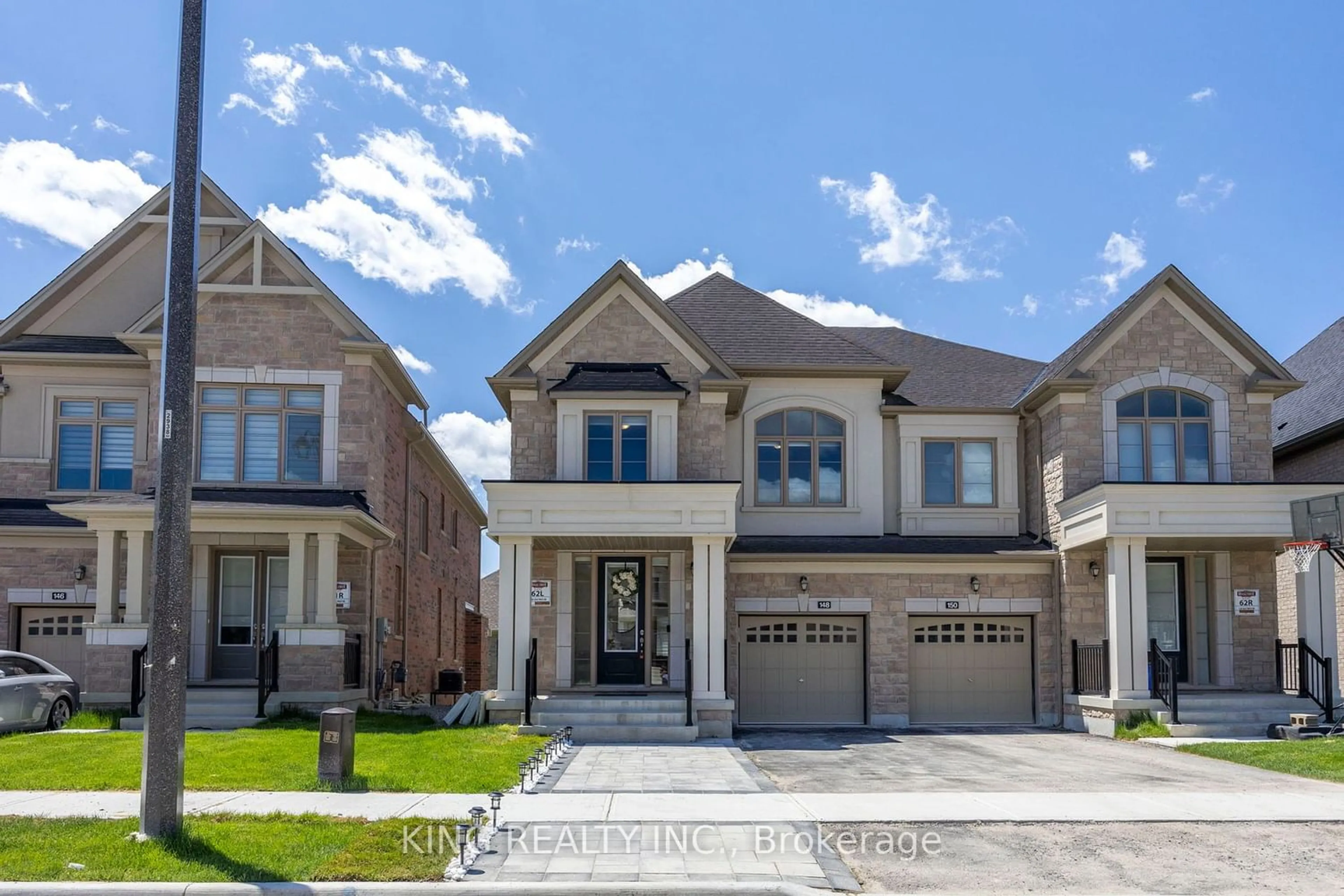 Home with brick exterior material for 148 Silk Twist Dr, East Gwillimbury Ontario L9N 0V7