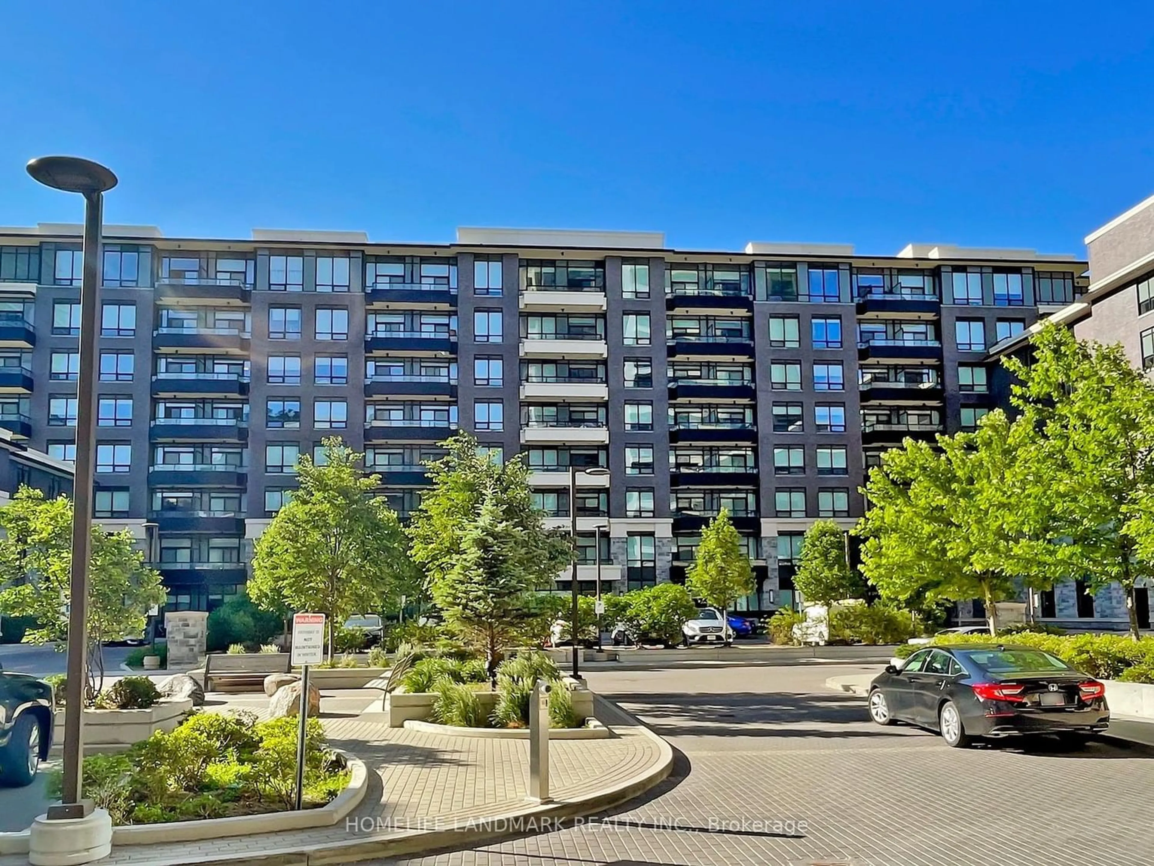 A pic from exterior of the house or condo for 25 Water Walk Dr #528, Markham Ontario L6G 0G3