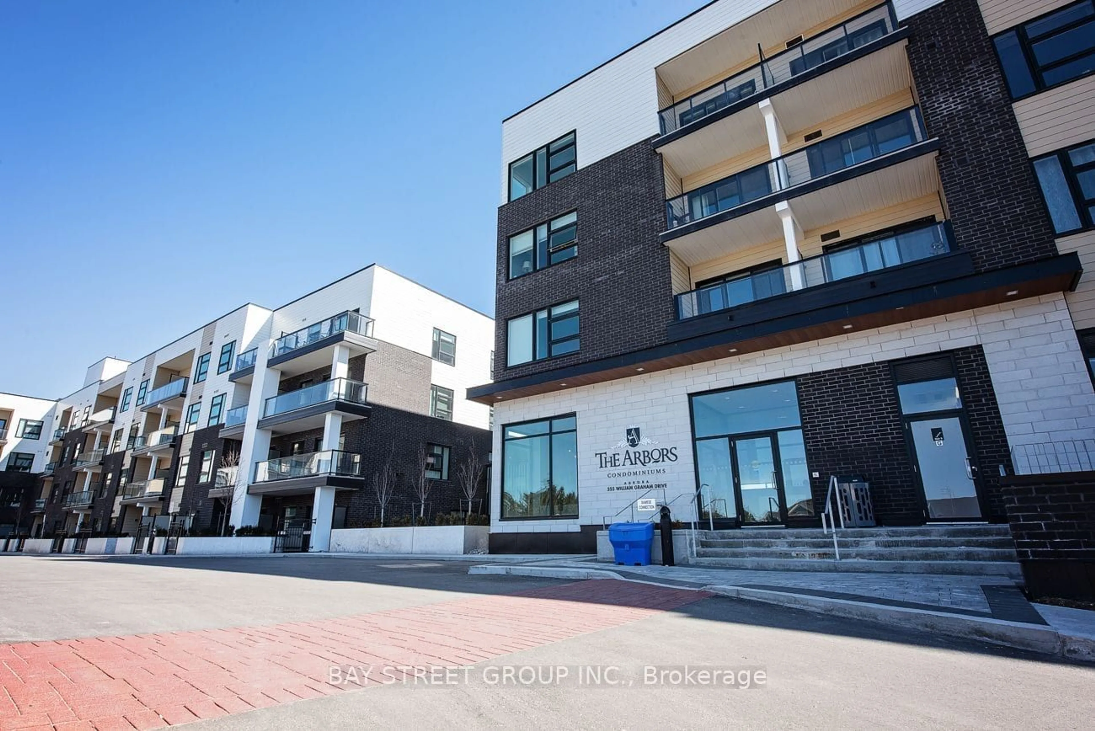 A pic from exterior of the house or condo for 555 William Graham Dr #214, Aurora Ontario L4G 3H9