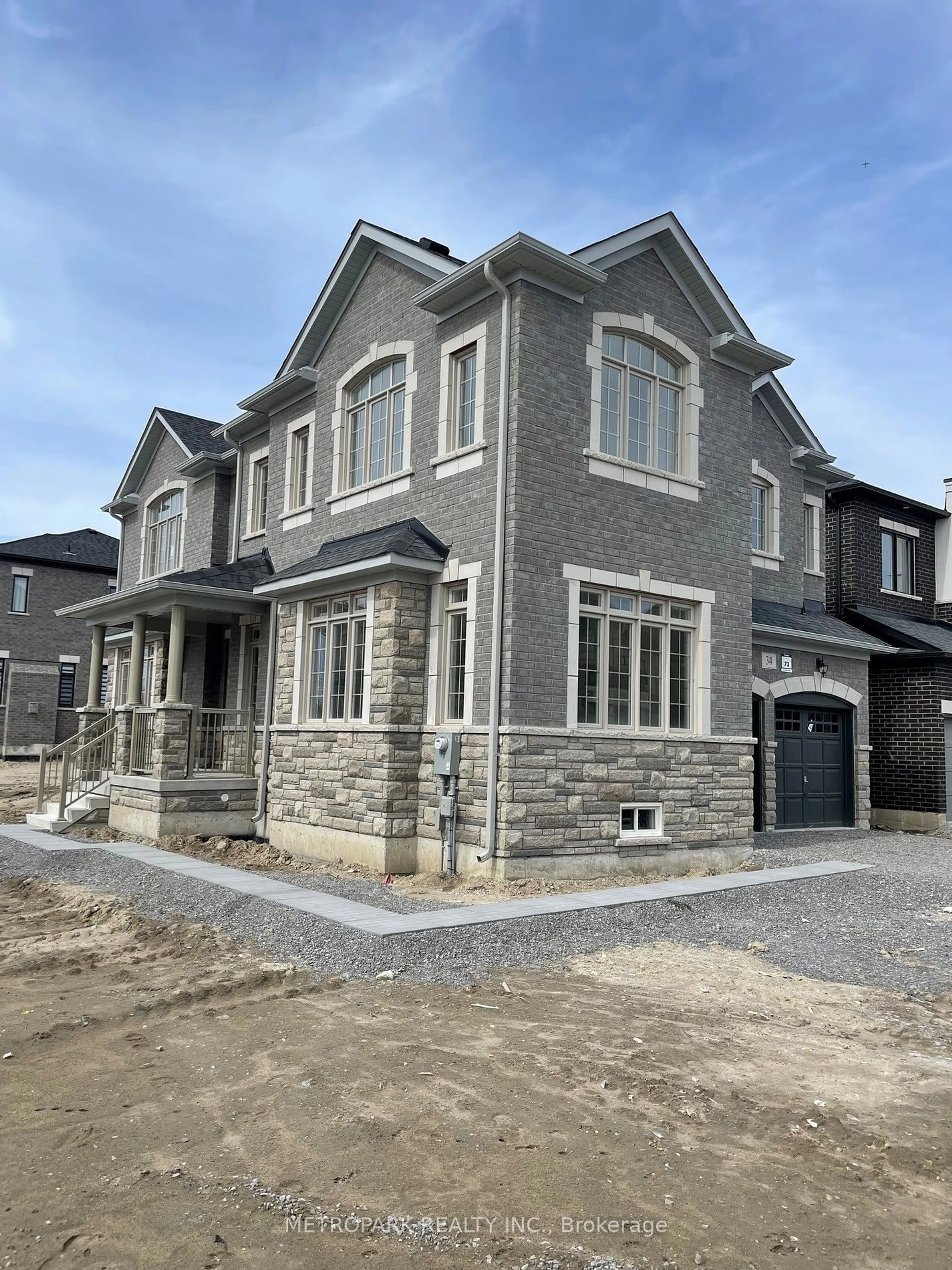 Home with brick exterior material for 34 Current Dr, Richmond Hill Ontario L4S 0M9