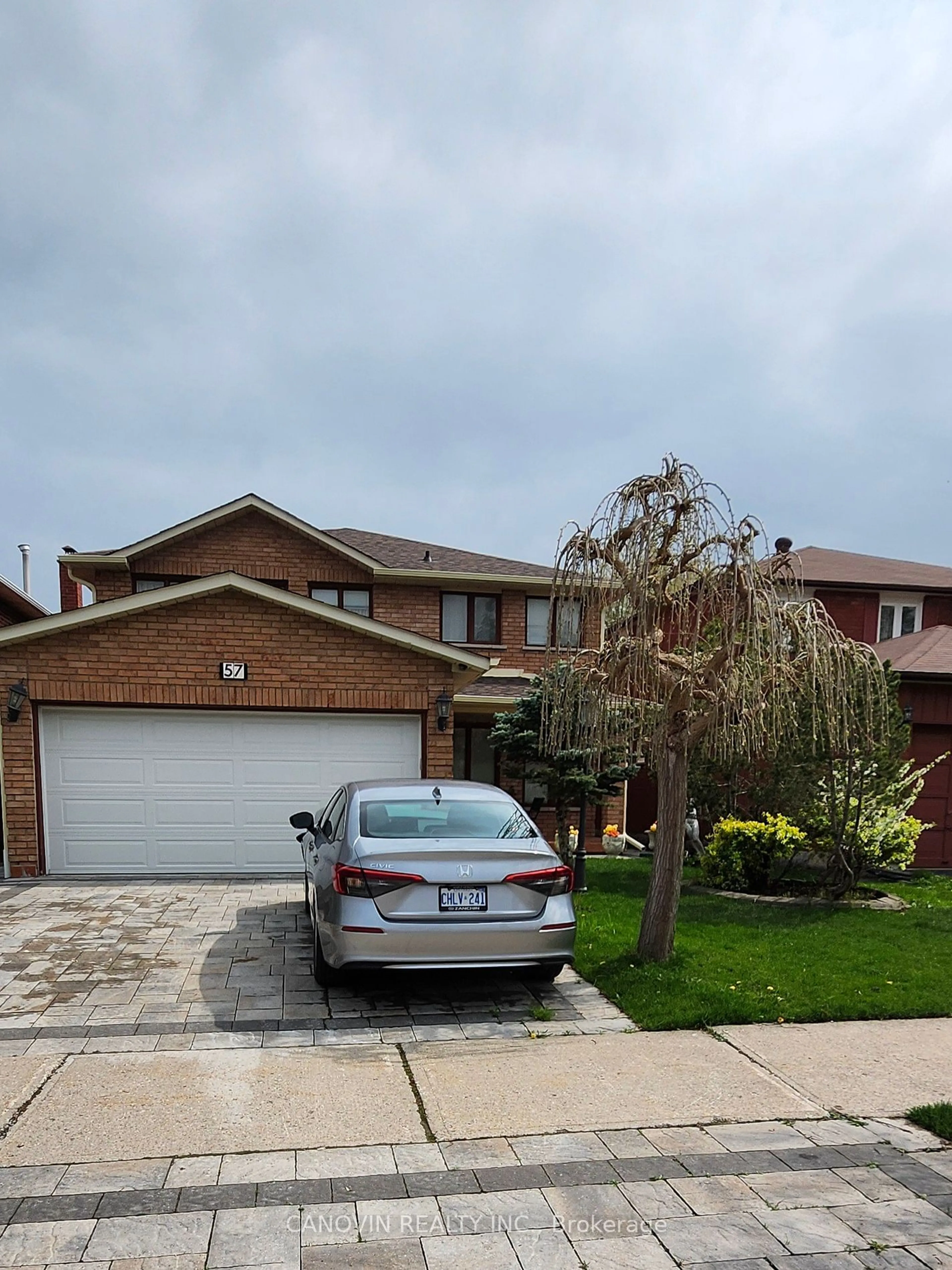 Frontside or backside of a home for 57 canterbury Crt, Richmond Hill Ontario L4C 8E6