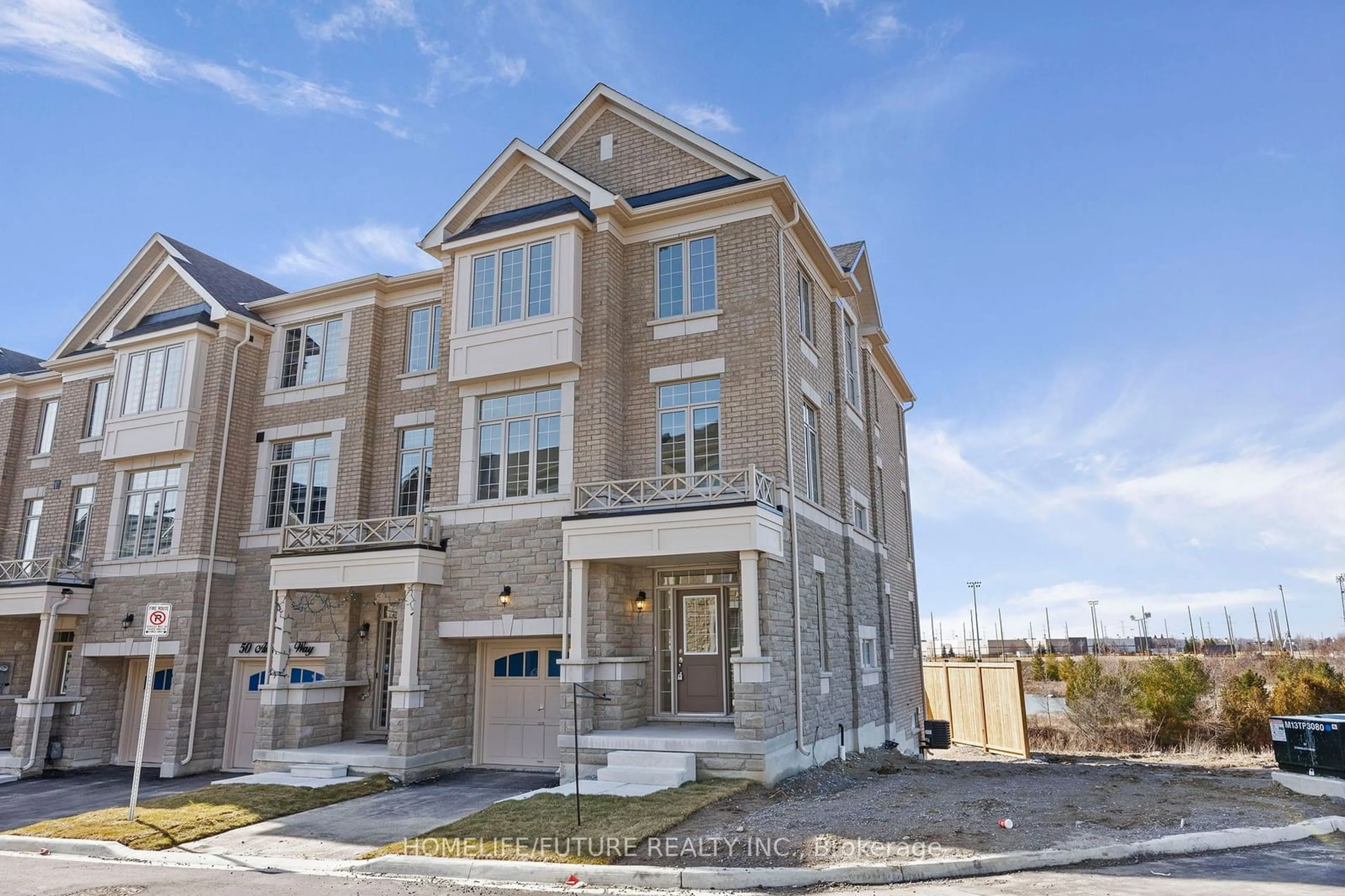 A pic from exterior of the house or condo for 52 Andress Way, Markham Ontario L3S 0E5