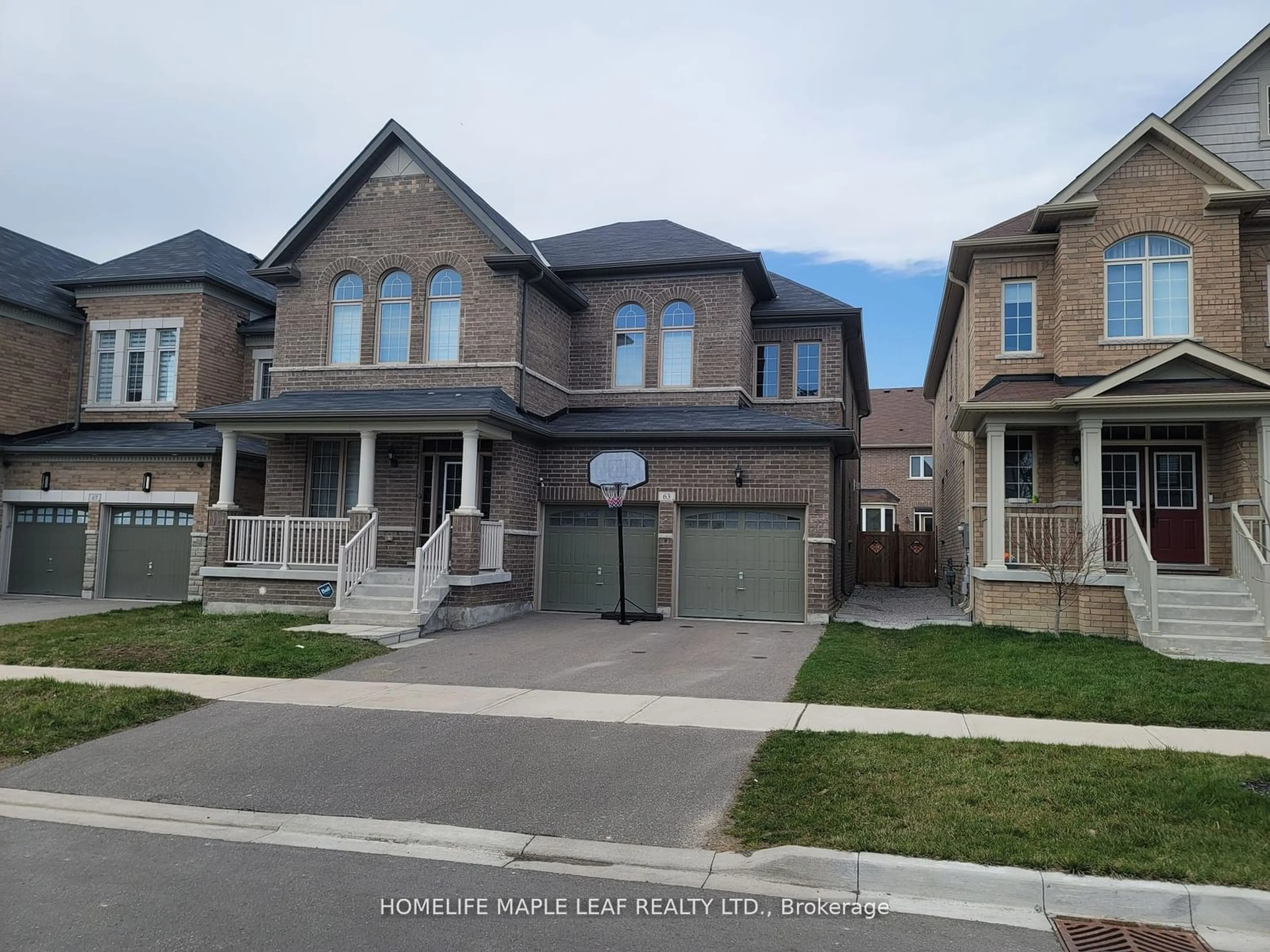 Frontside or backside of a home, the street view for 63 Boone Cres, Vaughan Ontario L0J 1C0