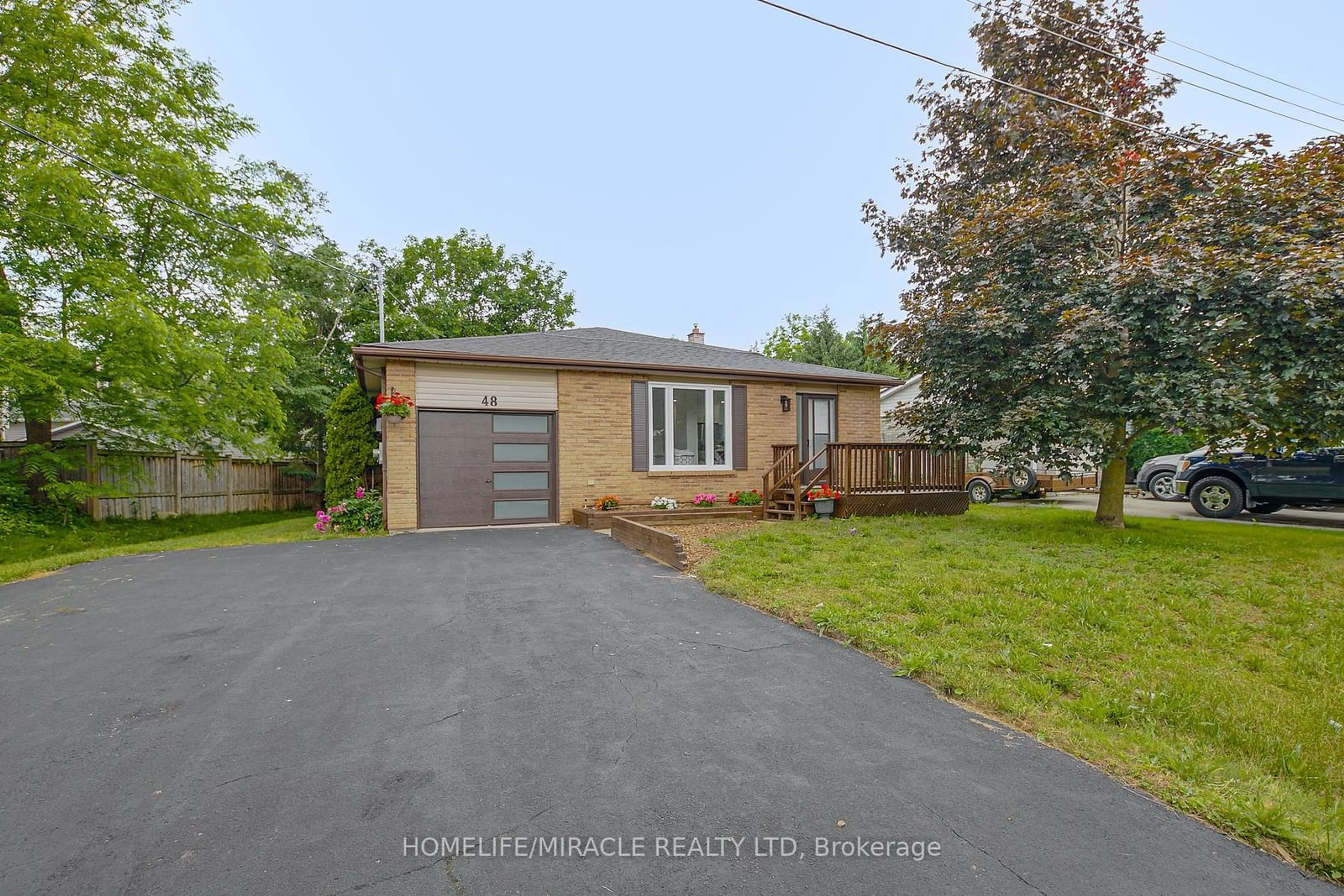 Frontside or backside of a home for 48 Walnut St, New Tecumseth Ontario L9R 1K2