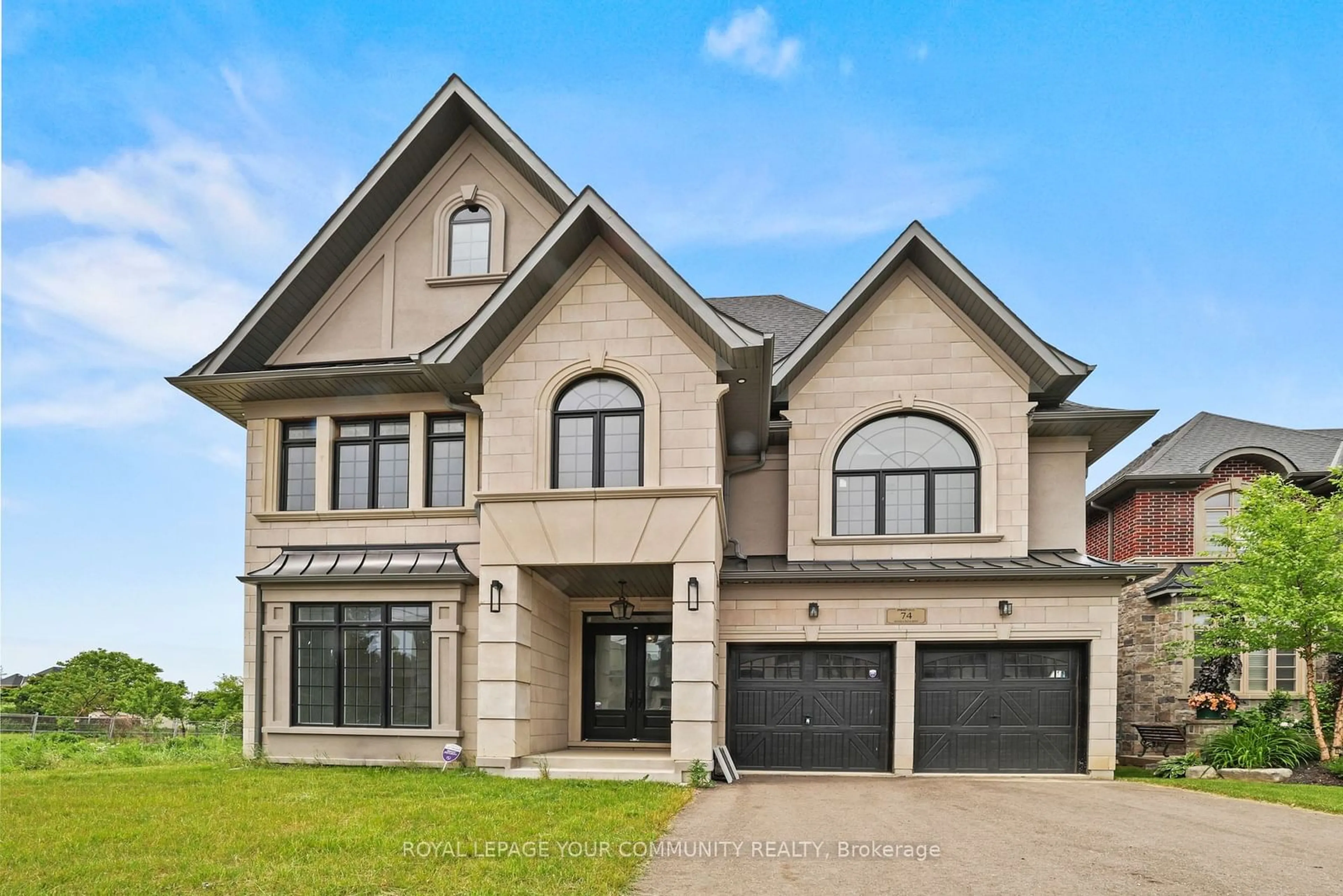 Home with brick exterior material for 74 Bond Cres, Richmond Hill Ontario L4E 3K6