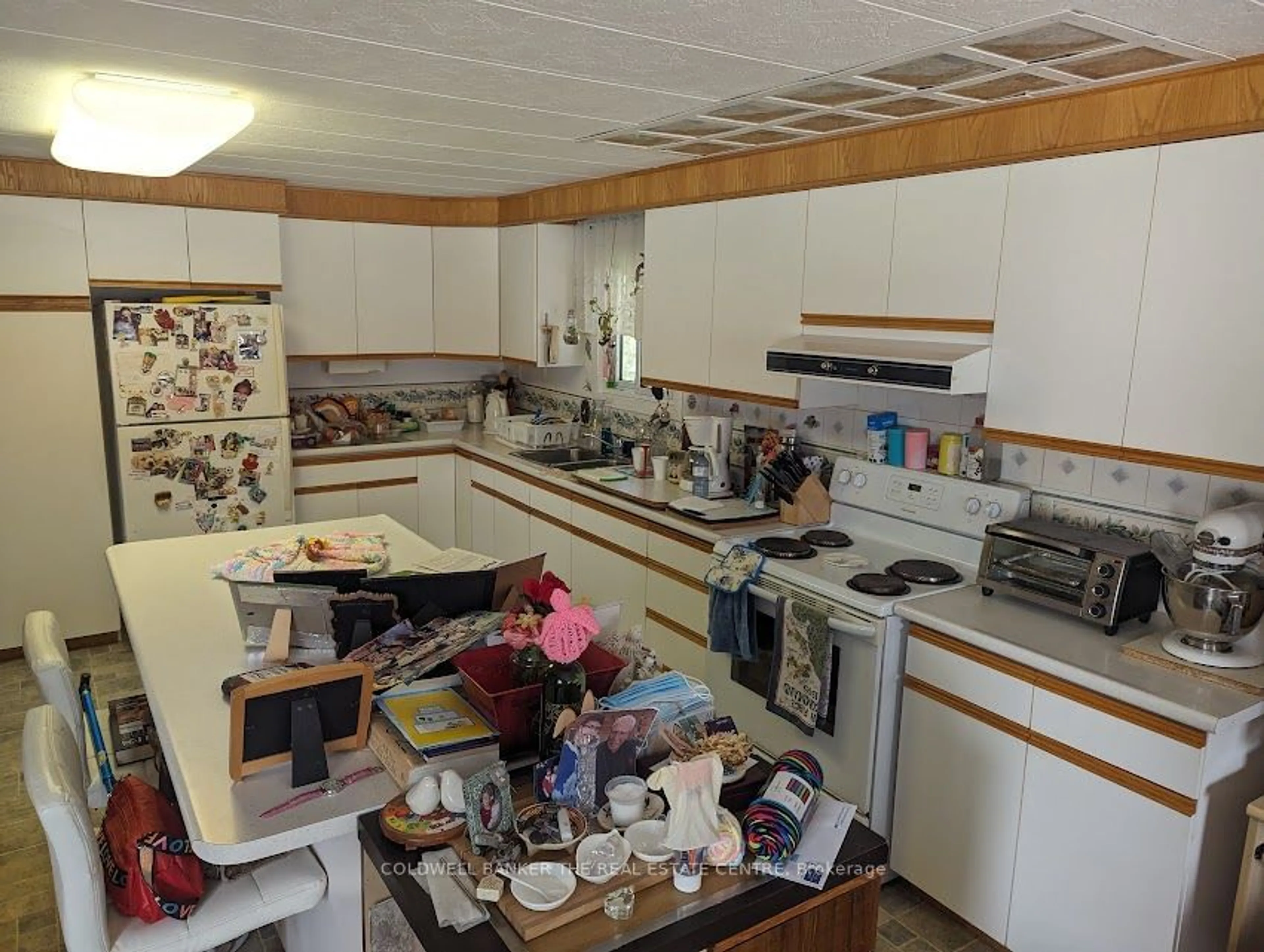 Kitchen, unknown floor, cottage for 8 Elmwood Crt, Innisfil Ontario L0L 1L0