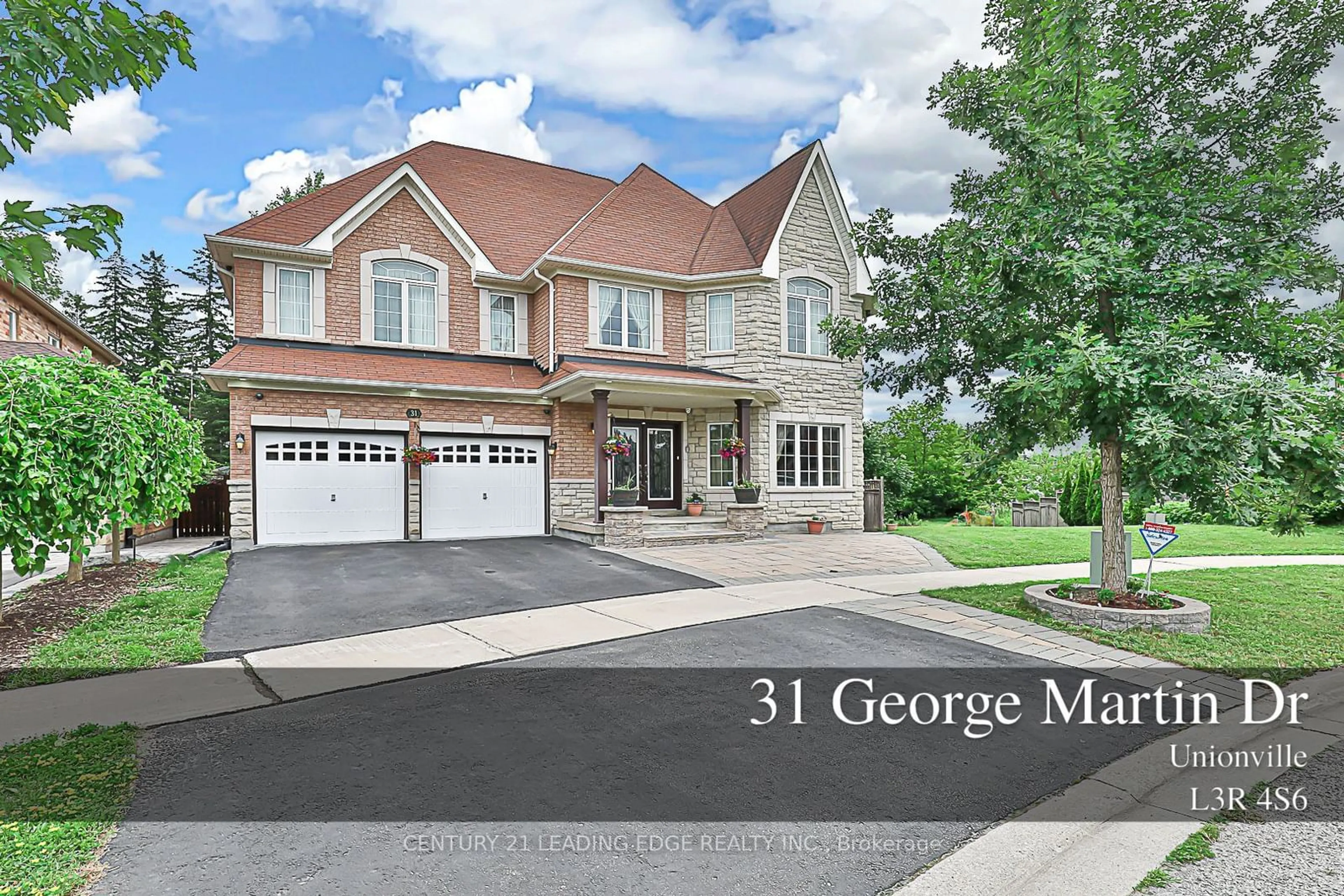 Home with brick exterior material for 31 George Martin Dr, Markham Ontario L3R 4S6