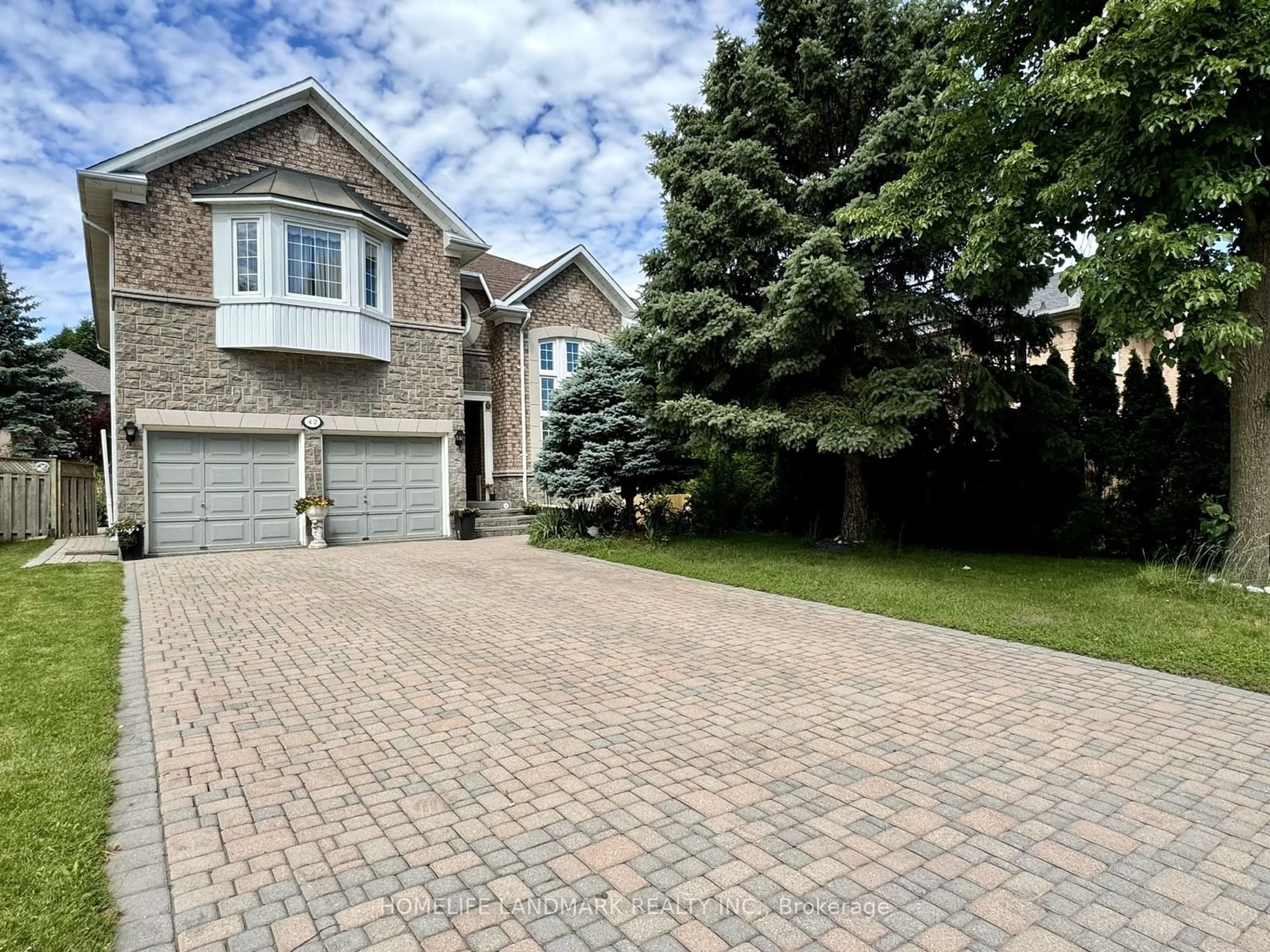 Home with brick exterior material for 42 Bretton Circ, Markham Ontario L3S 3R1