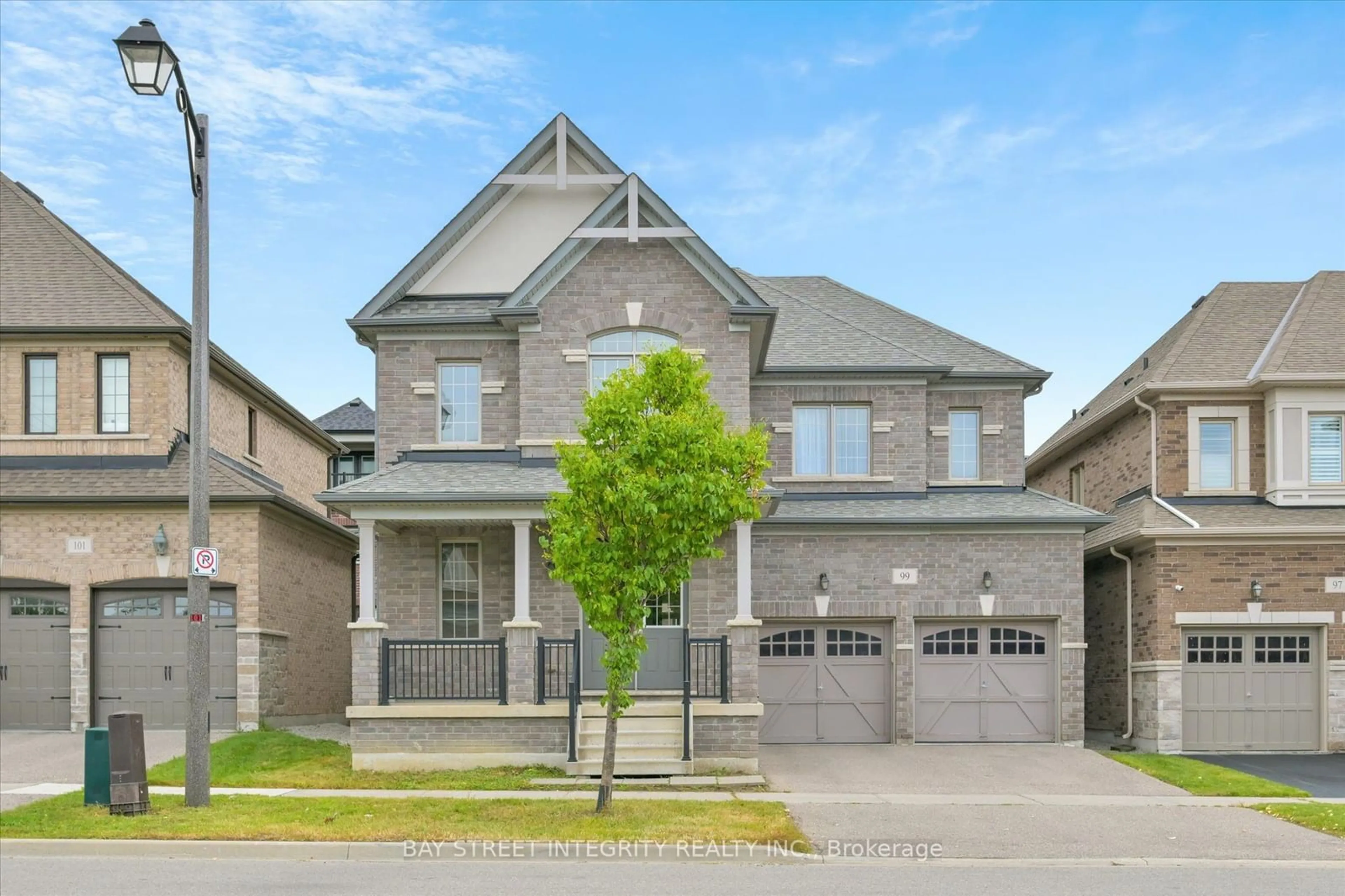 Home with brick exterior material for 99 Greenspire Ave, Markham Ontario L6E 0S2
