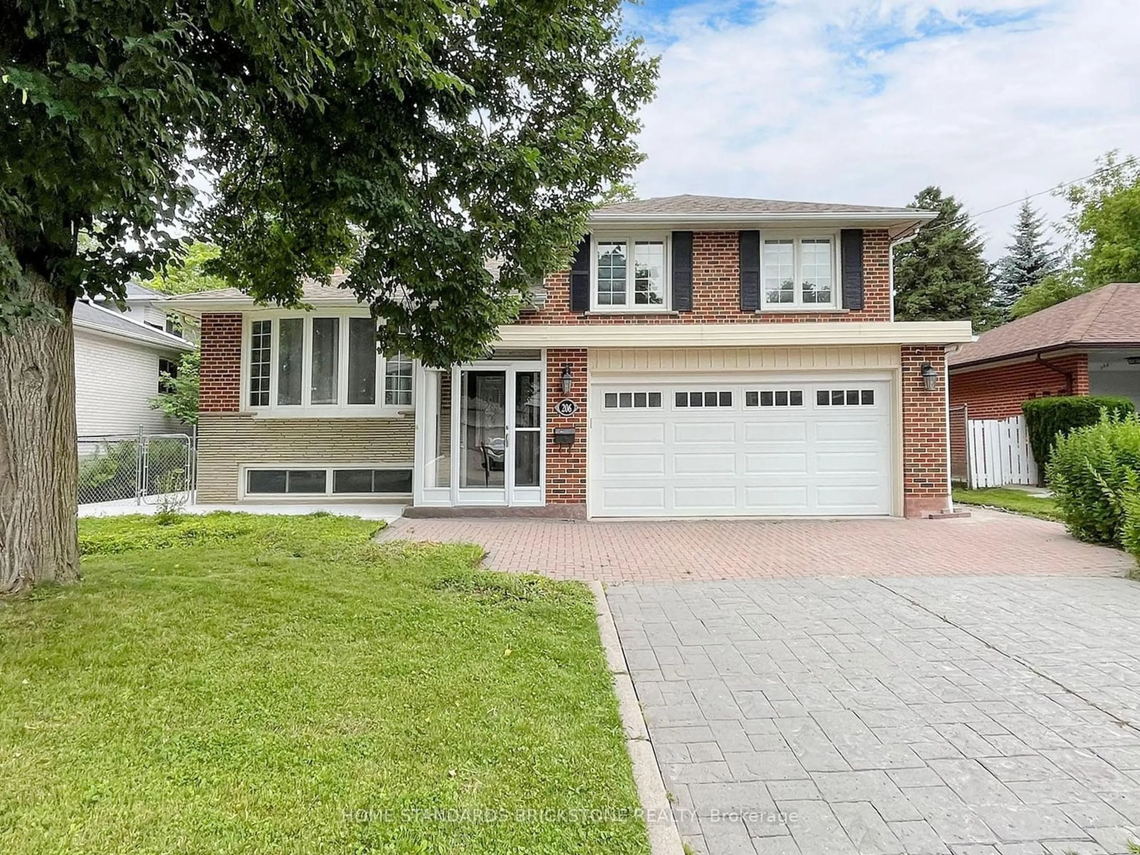 Home with brick exterior material for 206 Henderson Ave, Markham Ontario L3T 2L9