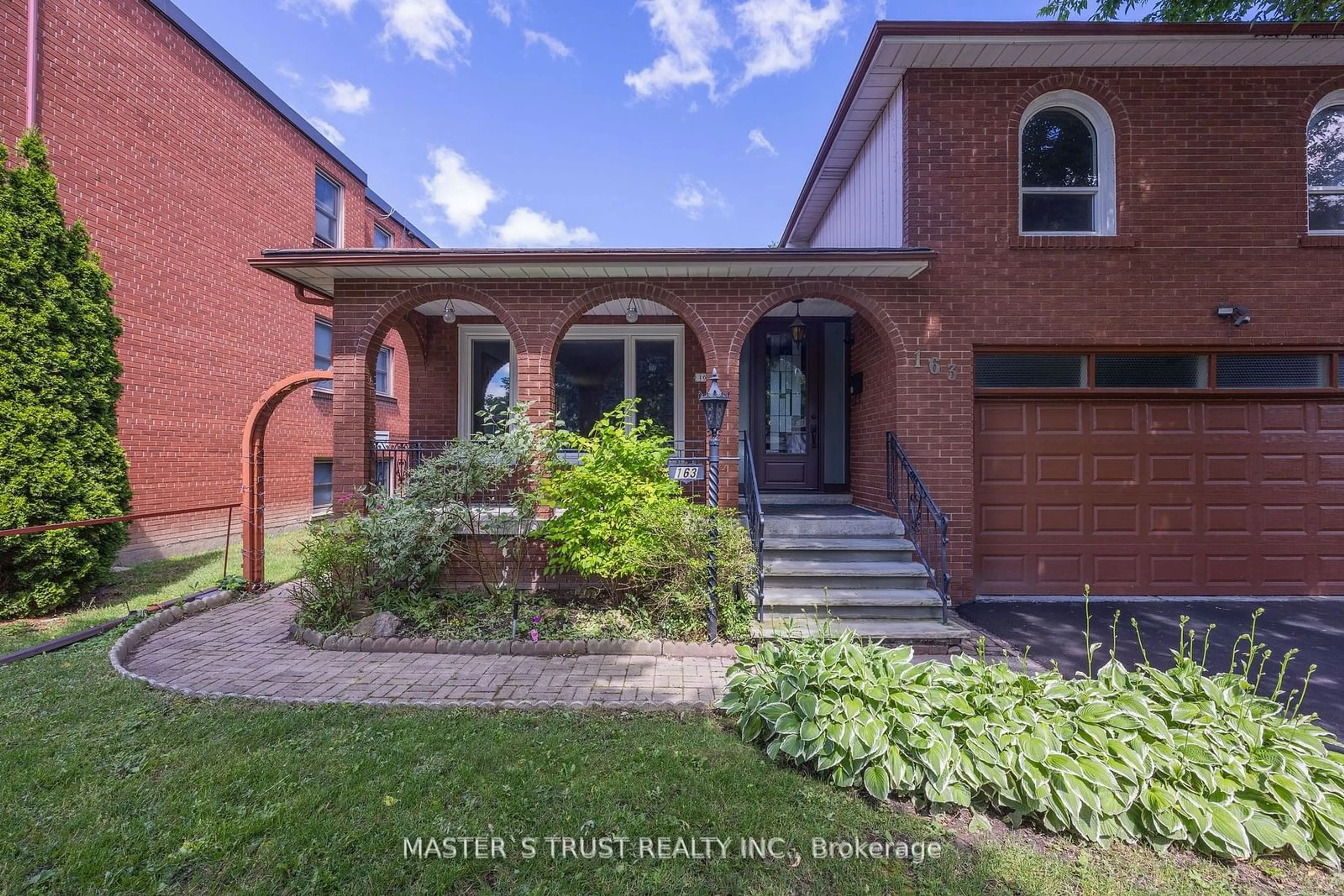 Home with brick exterior material for 163 Baker Ave, Richmond Hill Ontario L4C 1X7