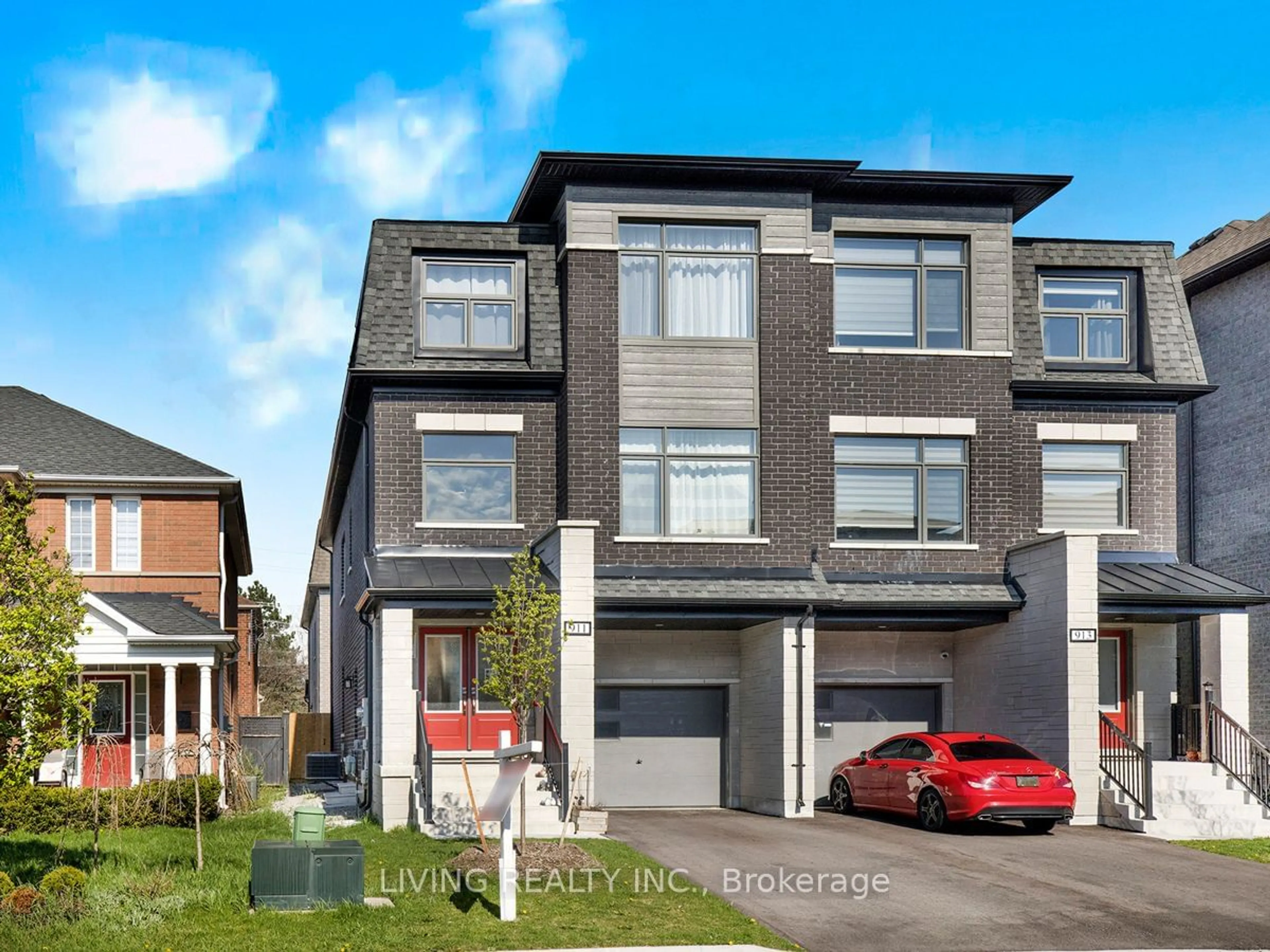 A pic from exterior of the house or condo for 911 Isaac Phillips Way, Newmarket Ontario L3X 2Y9