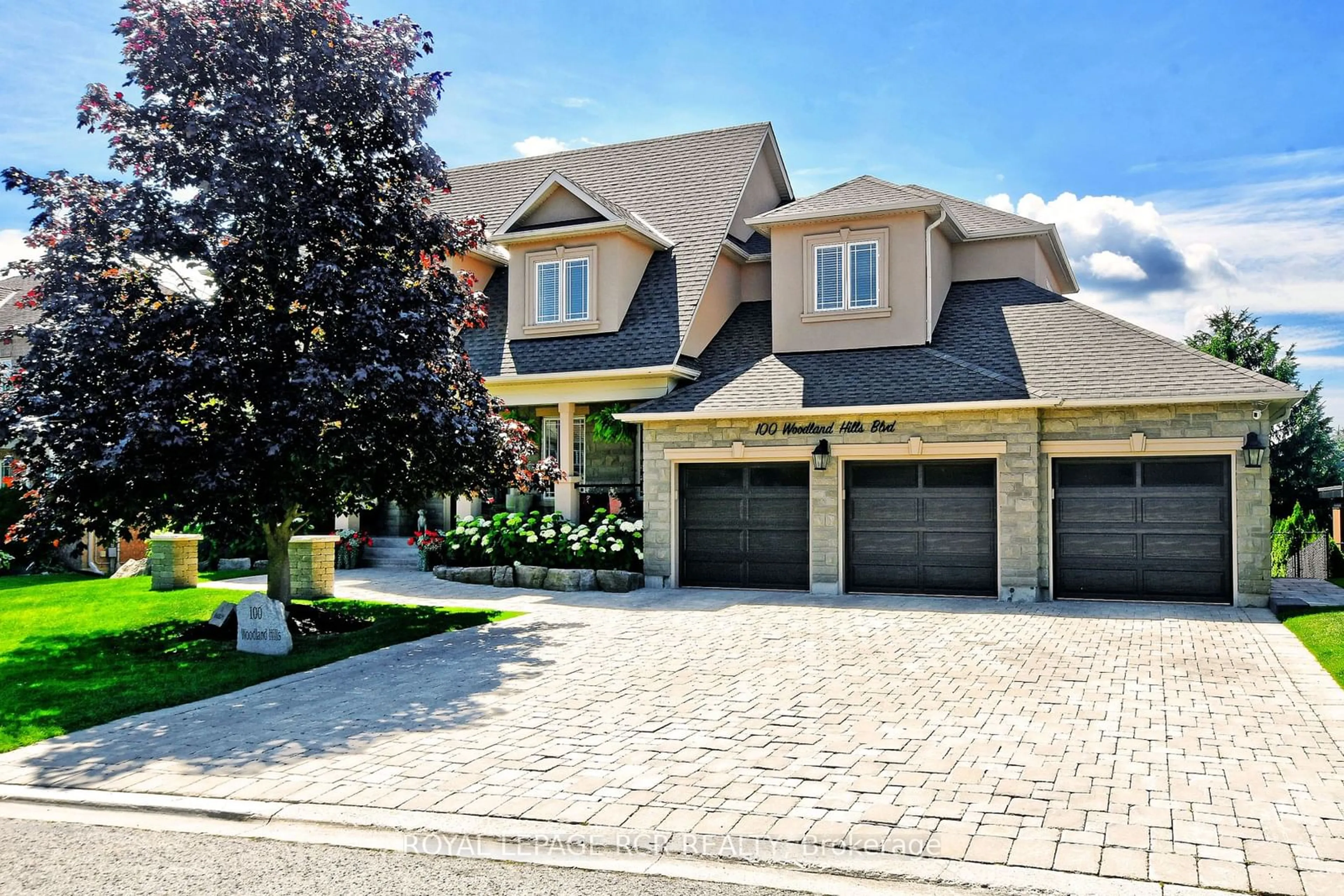 Home with brick exterior material for 100 Woodland Hills Blvd, Aurora Ontario L4G 7T5