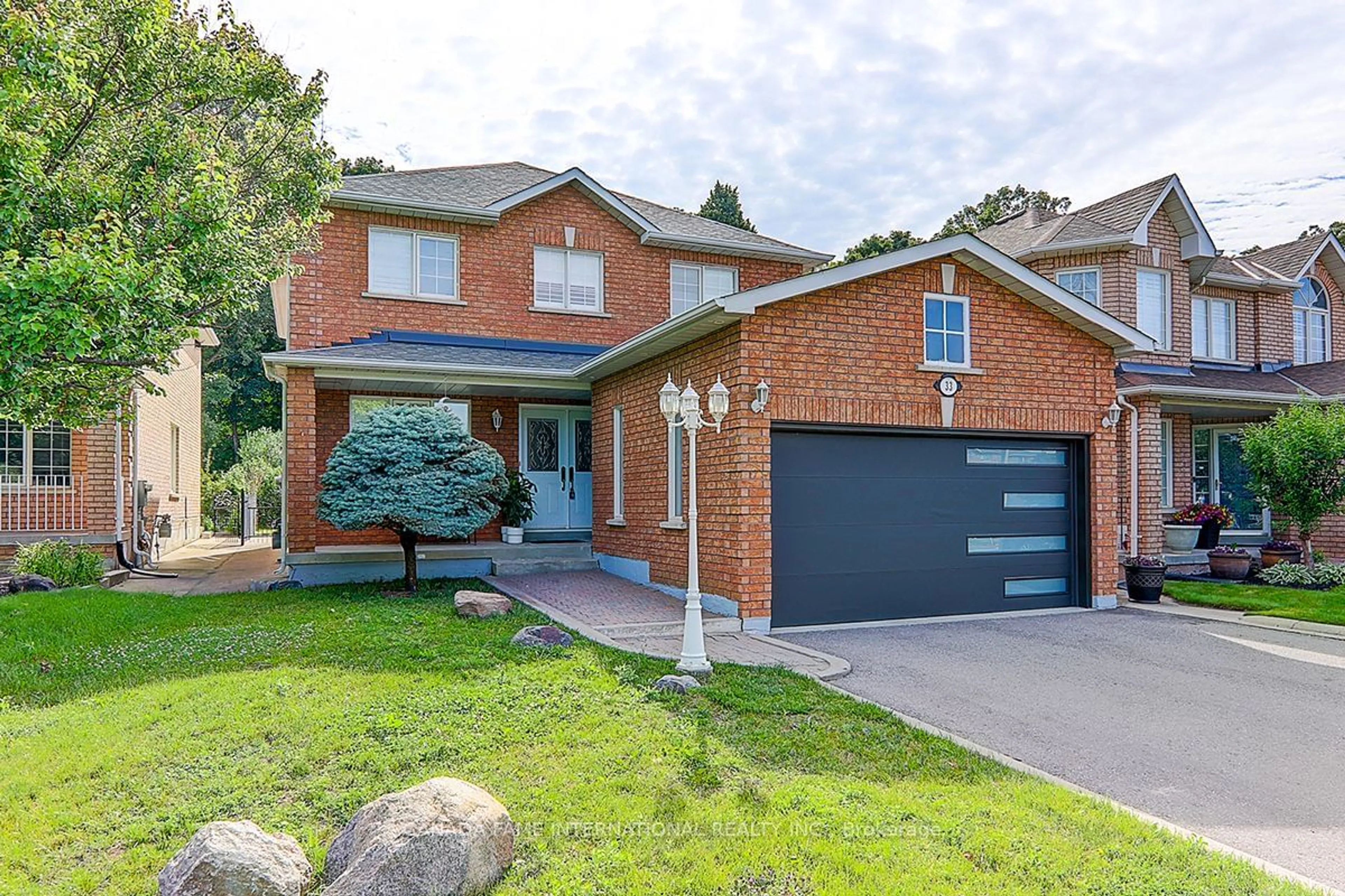 Home with brick exterior material for 33 Campania Crt, Vaughan Ontario L4H 1G4
