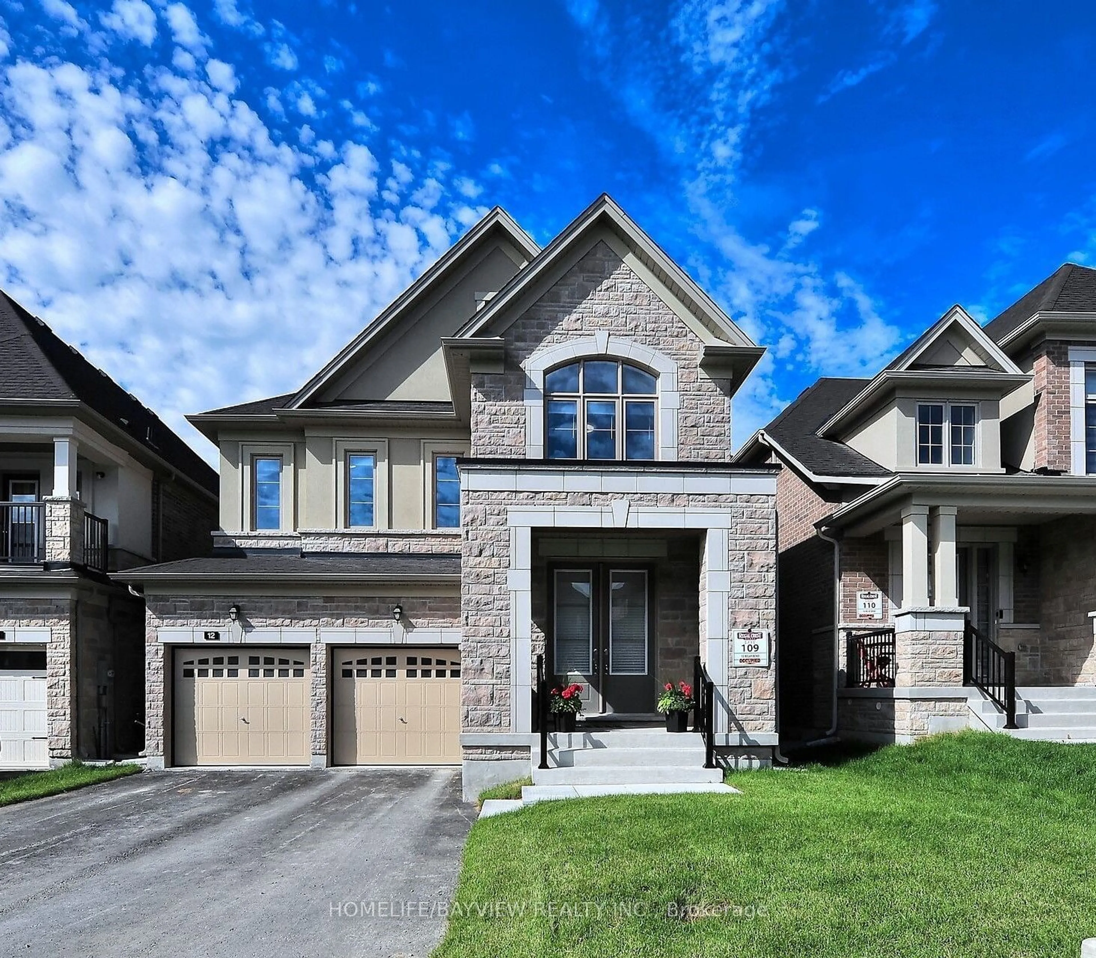 Home with brick exterior material for 12 Belay Bend, East Gwillimbury Ontario L9N 0V8